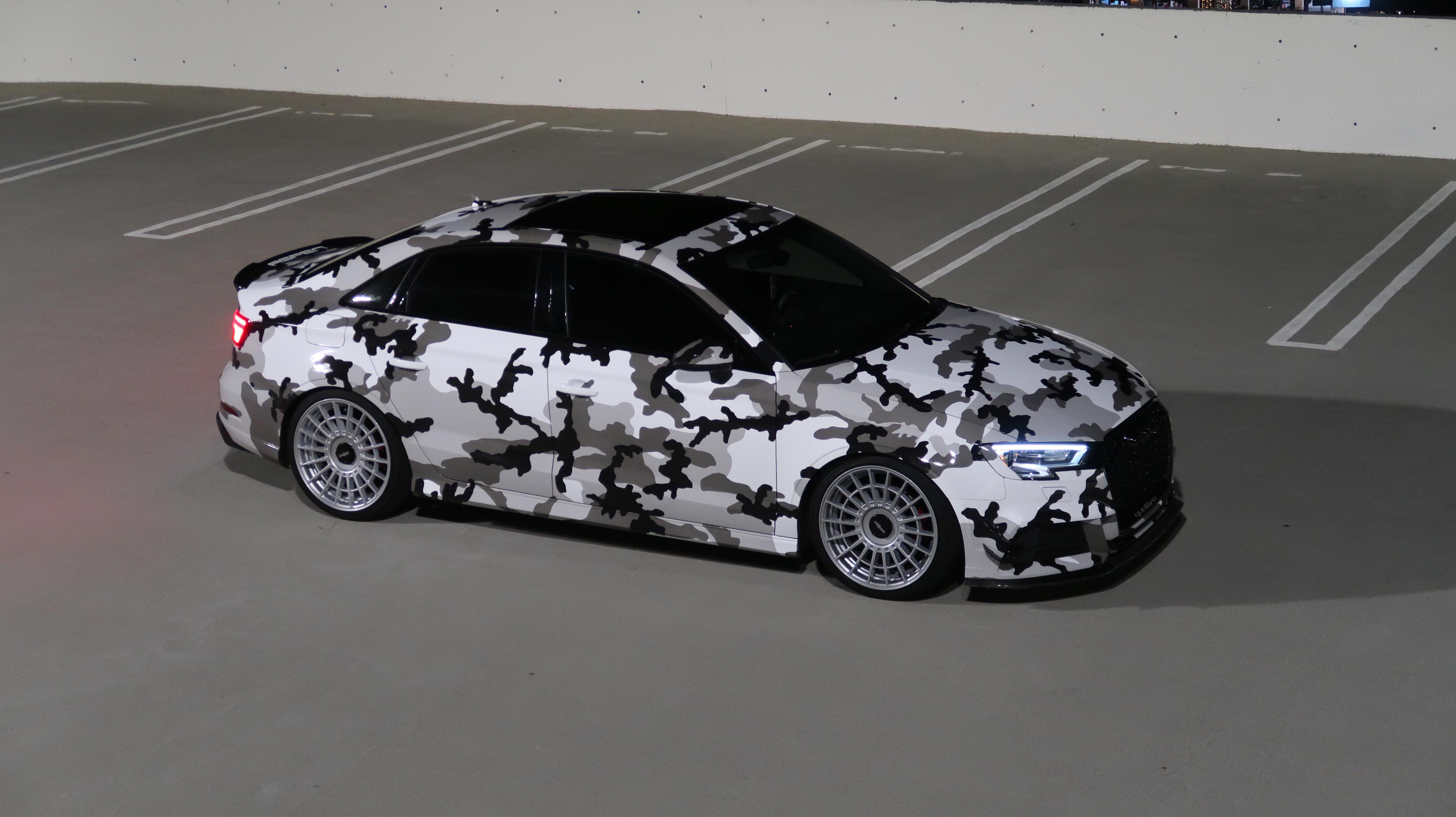 My snow camo wrapped Audi A3. Camo pattern continues from hood on to