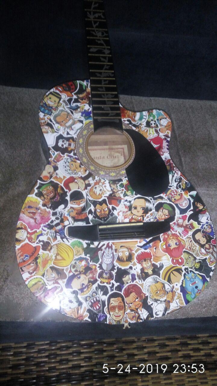 I sticker bombed my guitar!! (+spray painted the sides but that's a