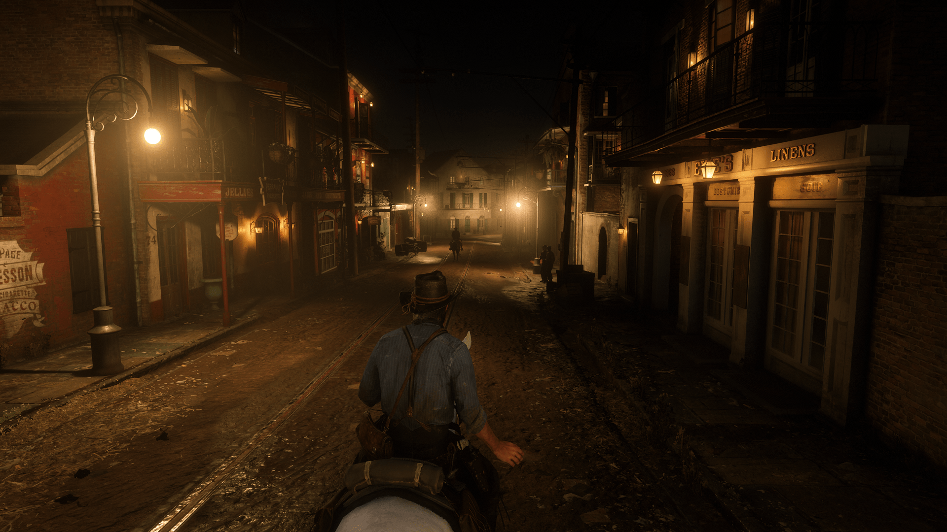 Riding at night in Saint Denis is absoutely stunning! r/reddeadredemption
