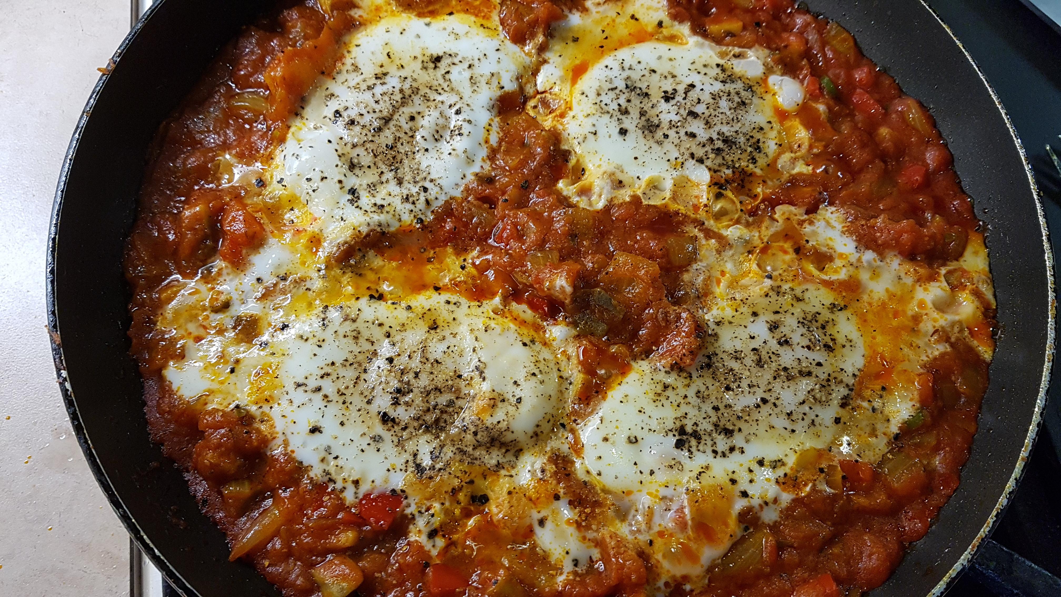 [Homemade] Shakshuka Baked spicy tomato sauce and eggs. r/food