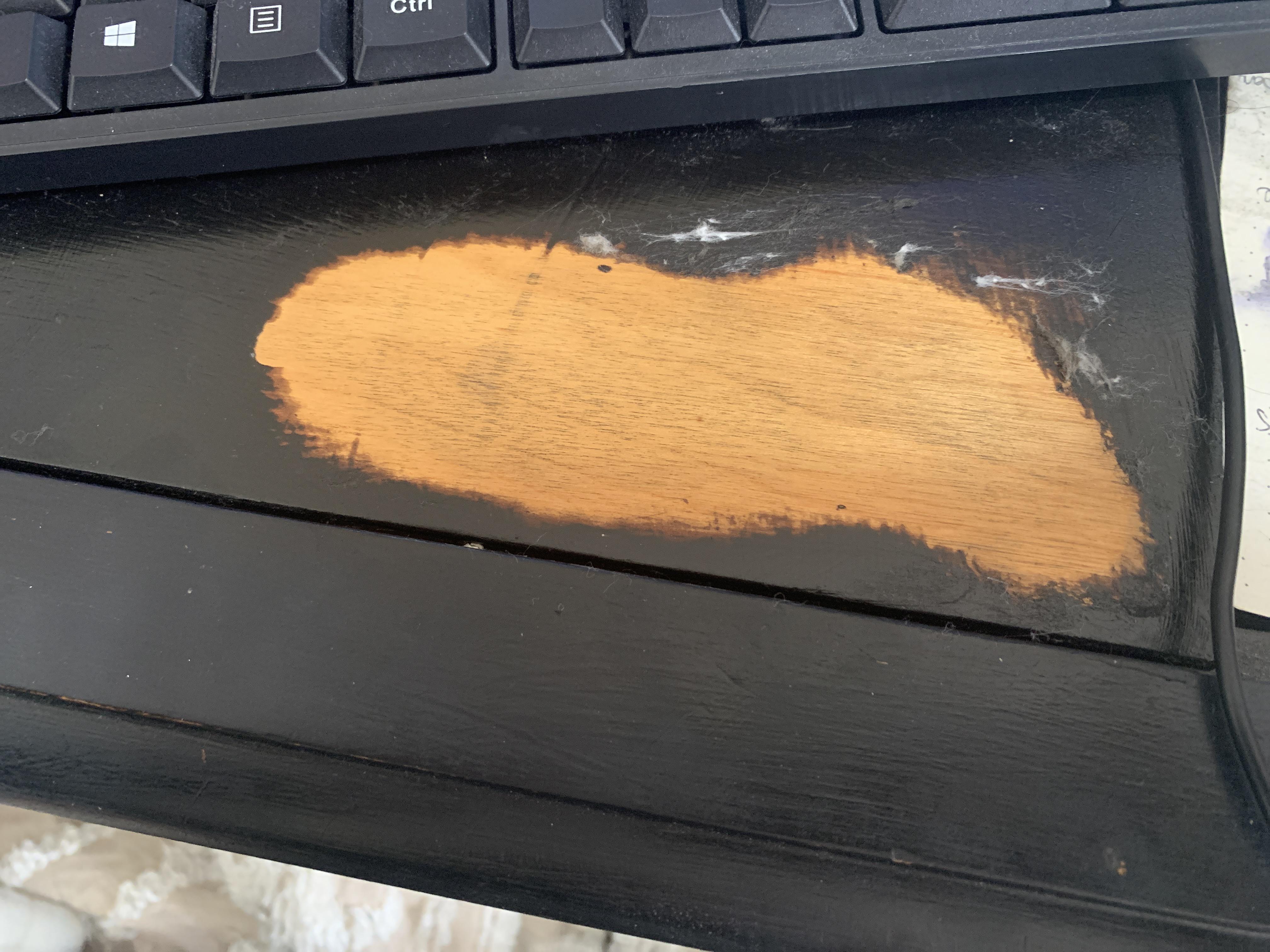 I accidentally spilled some acetone on the table and discovered some