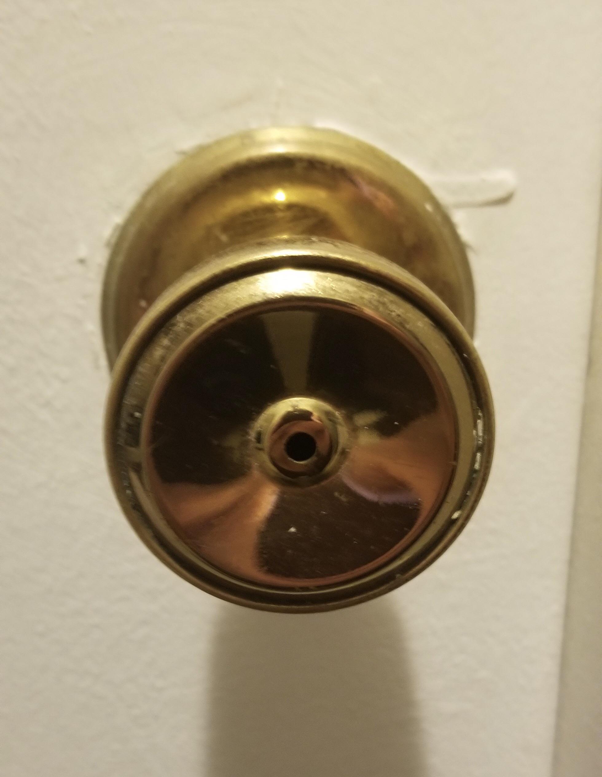 Door knob (nonlocking) is stuck closed turns a bit in both