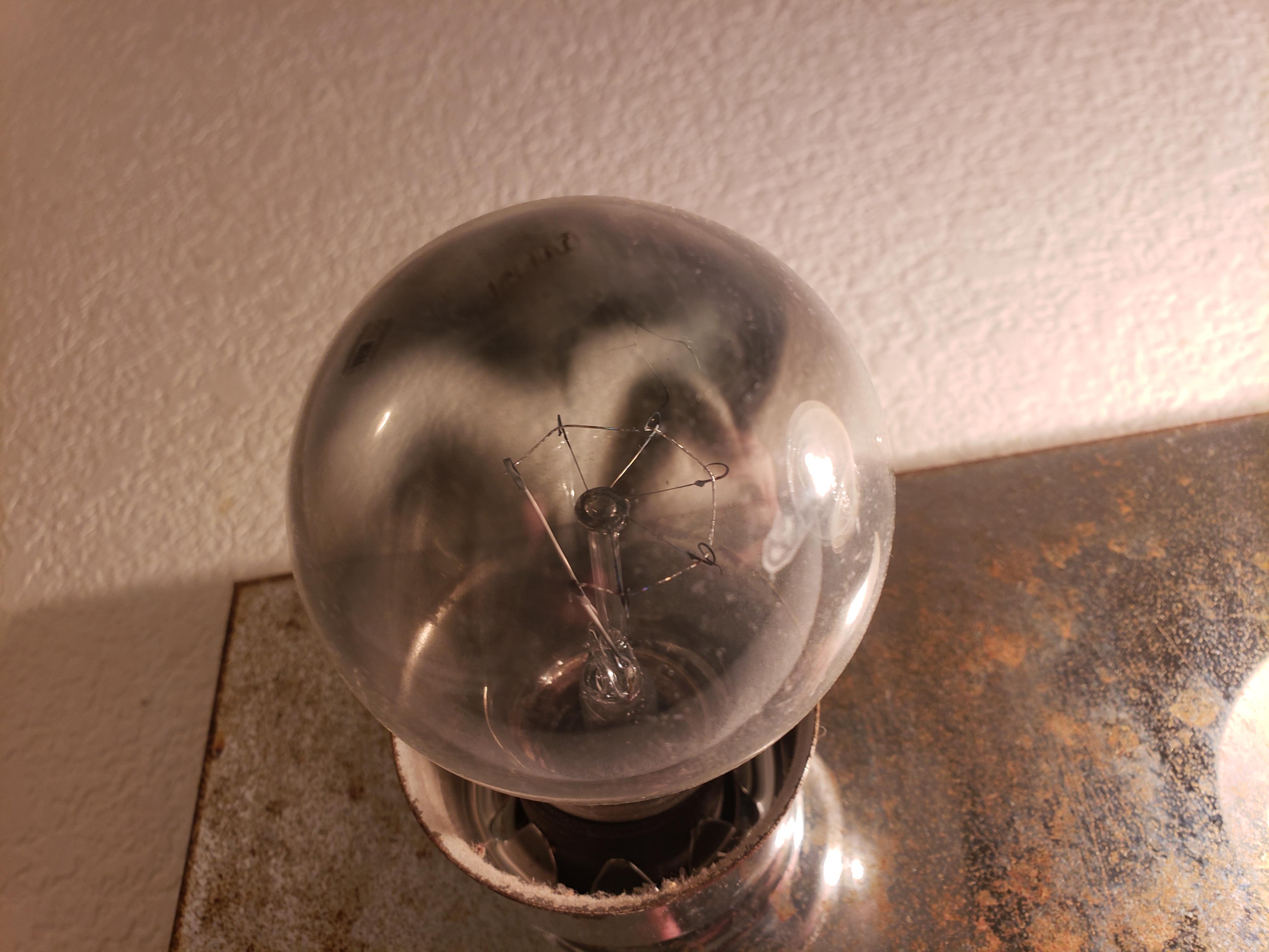 Light bulb blew out rather violently...charred and cracked r