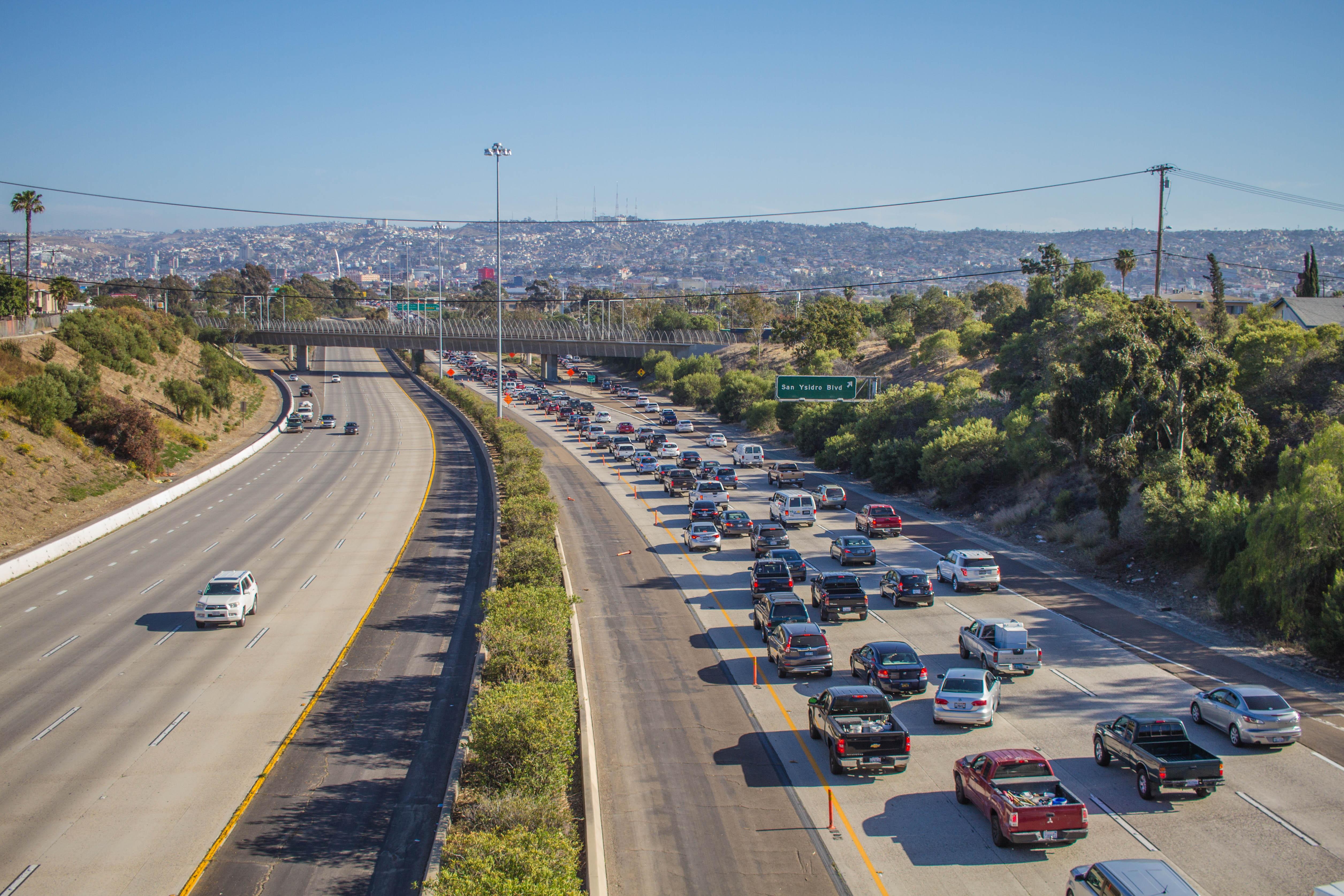 On the left, cars entering San Diego. On the right, cars going to