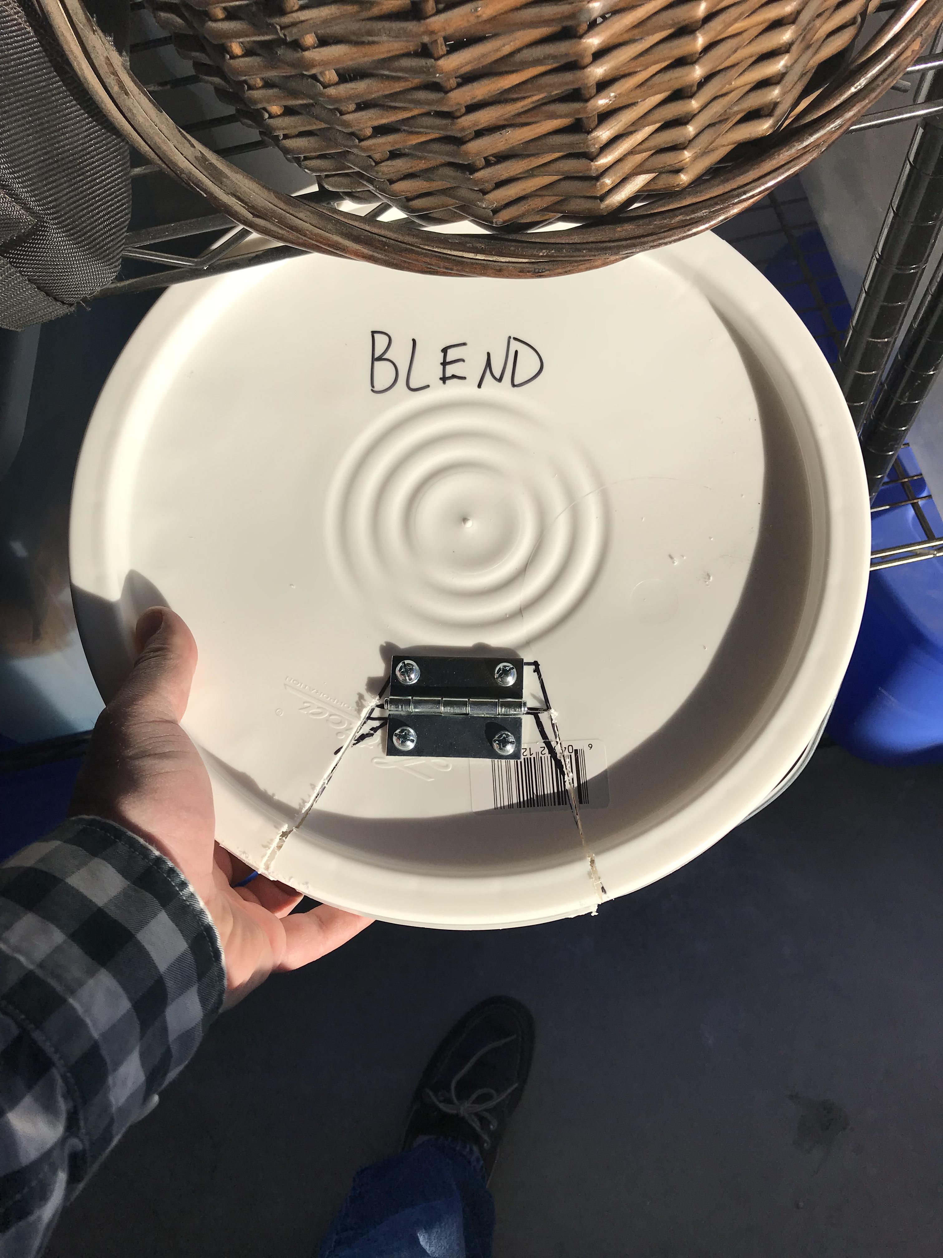 Homemade pellet storage cut 5 gal bucket lid and added hinges r/smoking