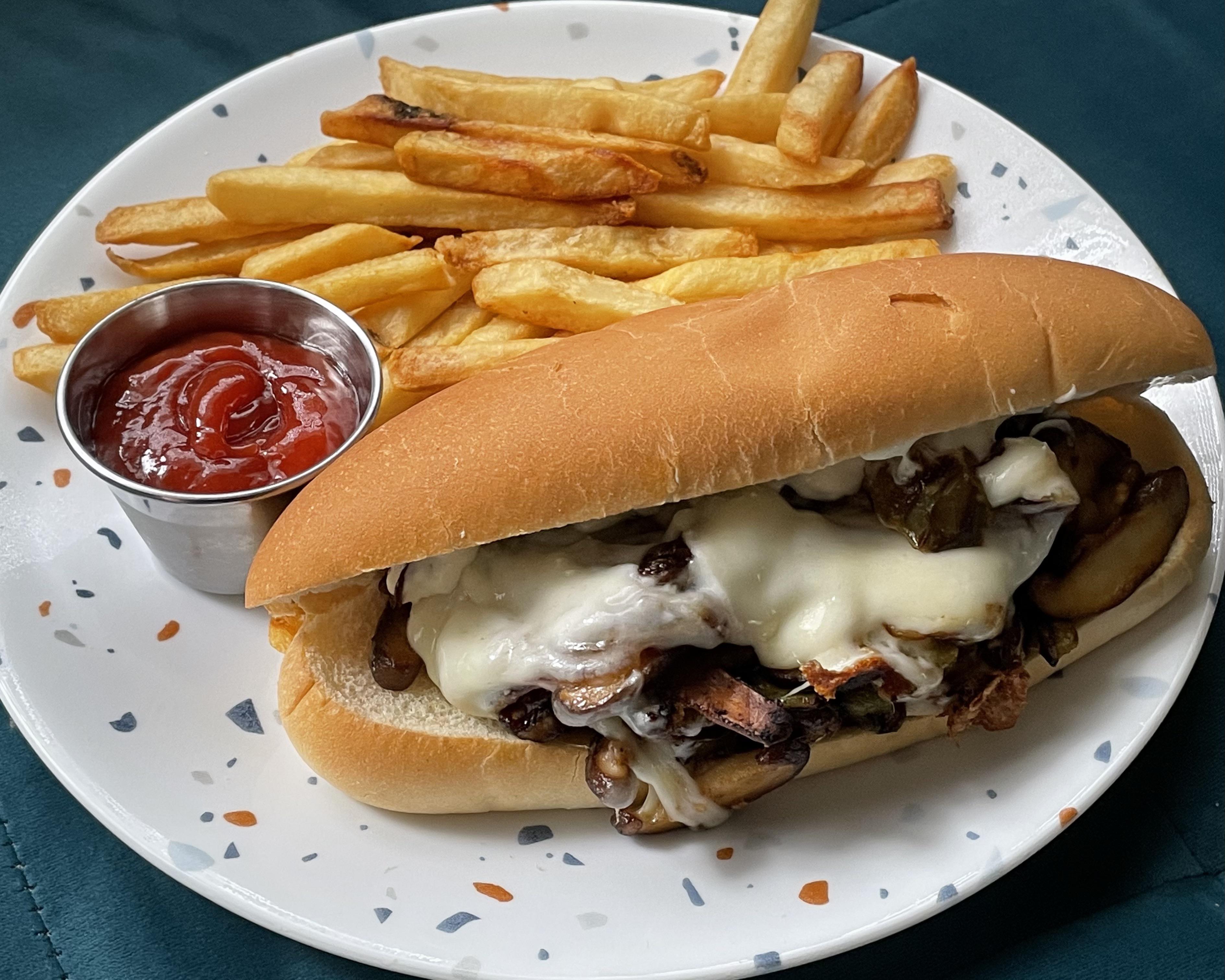 Shiitake mushroom “cheesesteak” with carmelized onions, green peppers