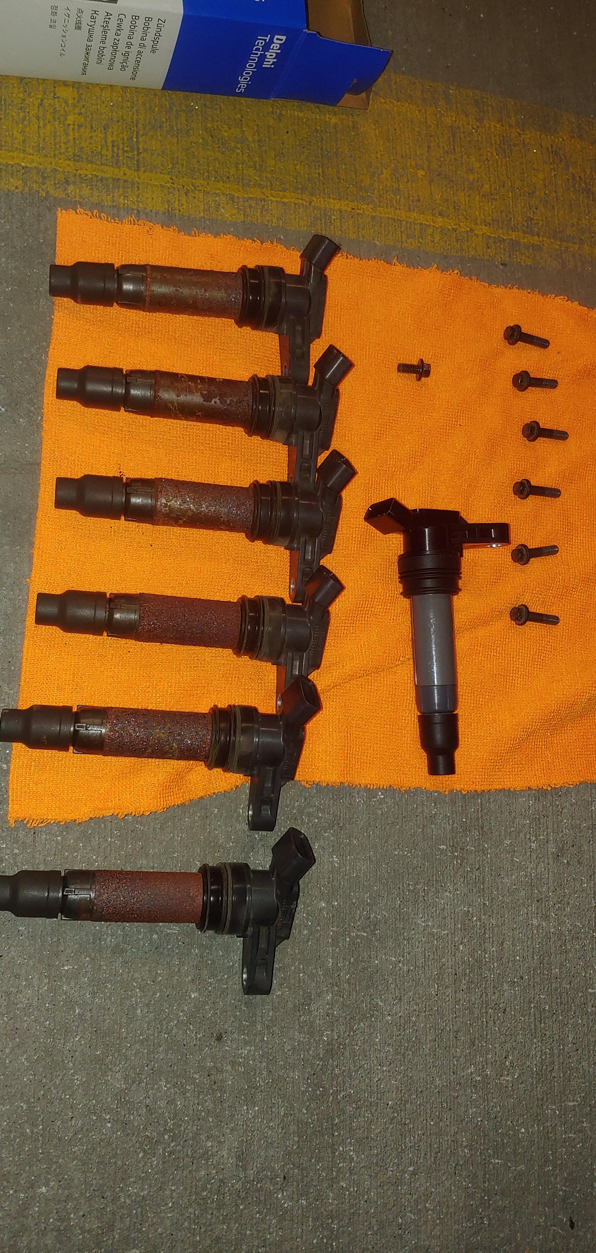 Replaced ignition coils and spark plugs. Should/How to clean coil