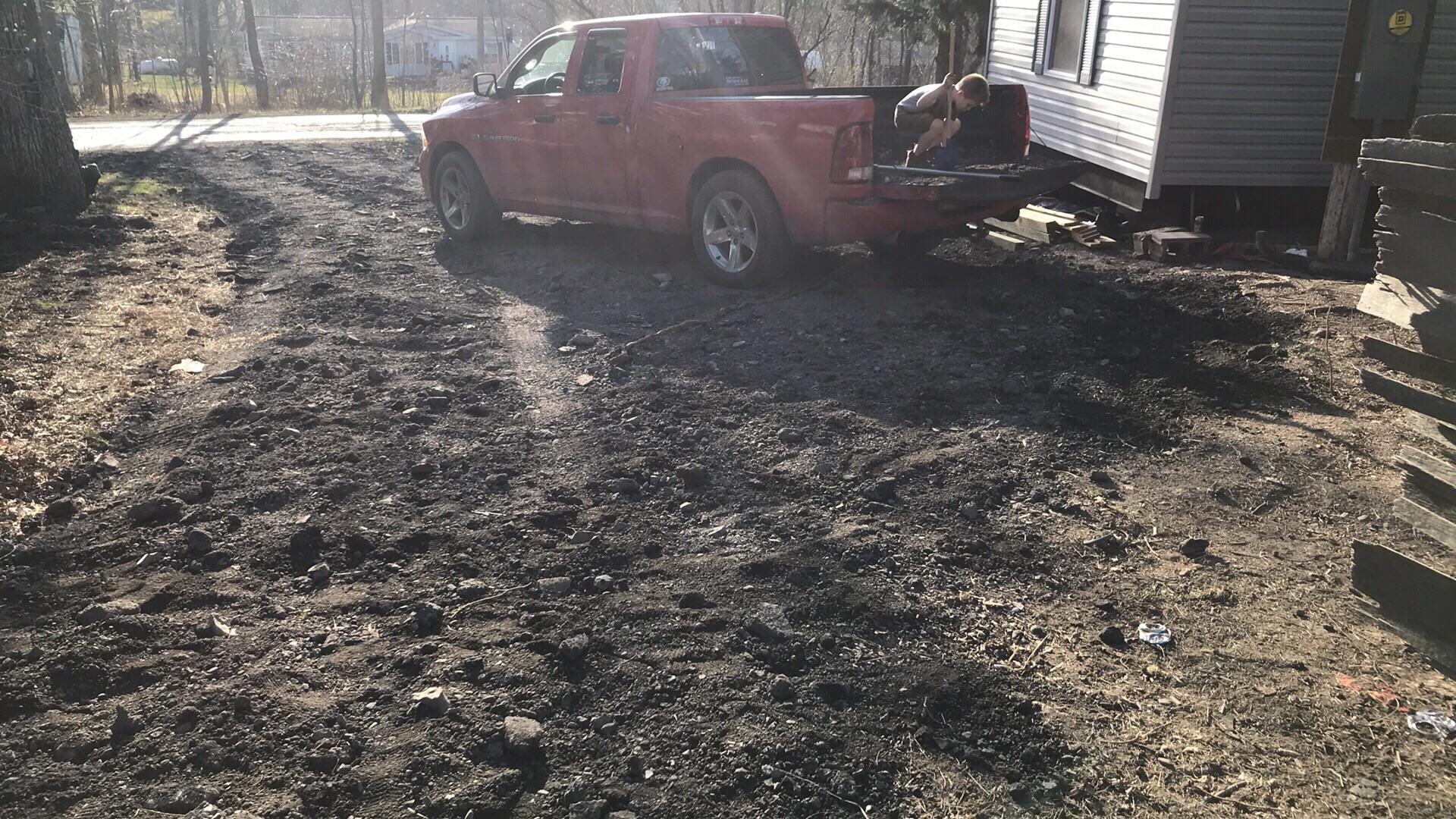 5 loads of road millings for free. For my new house came out to about 7