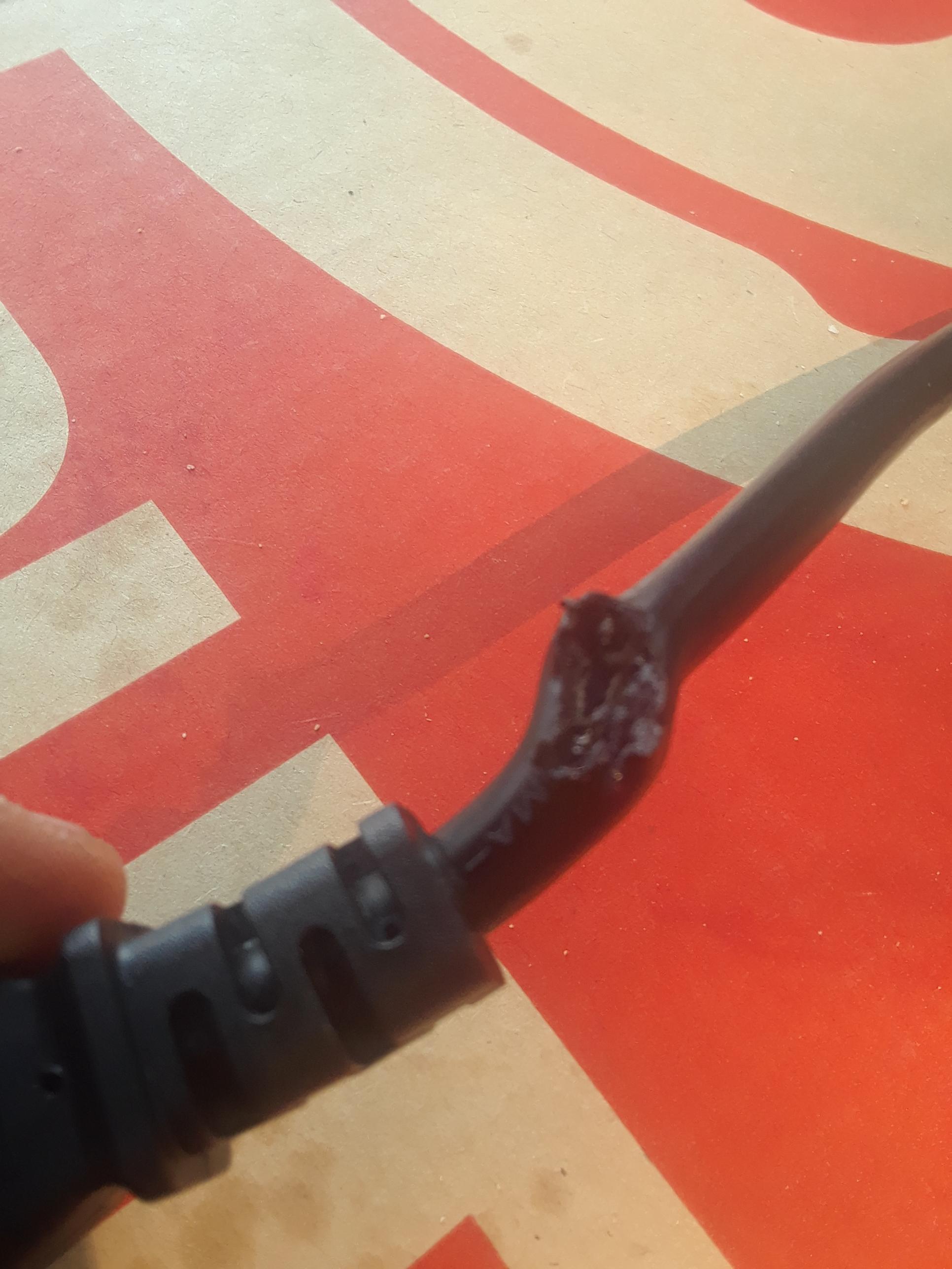 My power cable to my laptop caught fire r/techgore