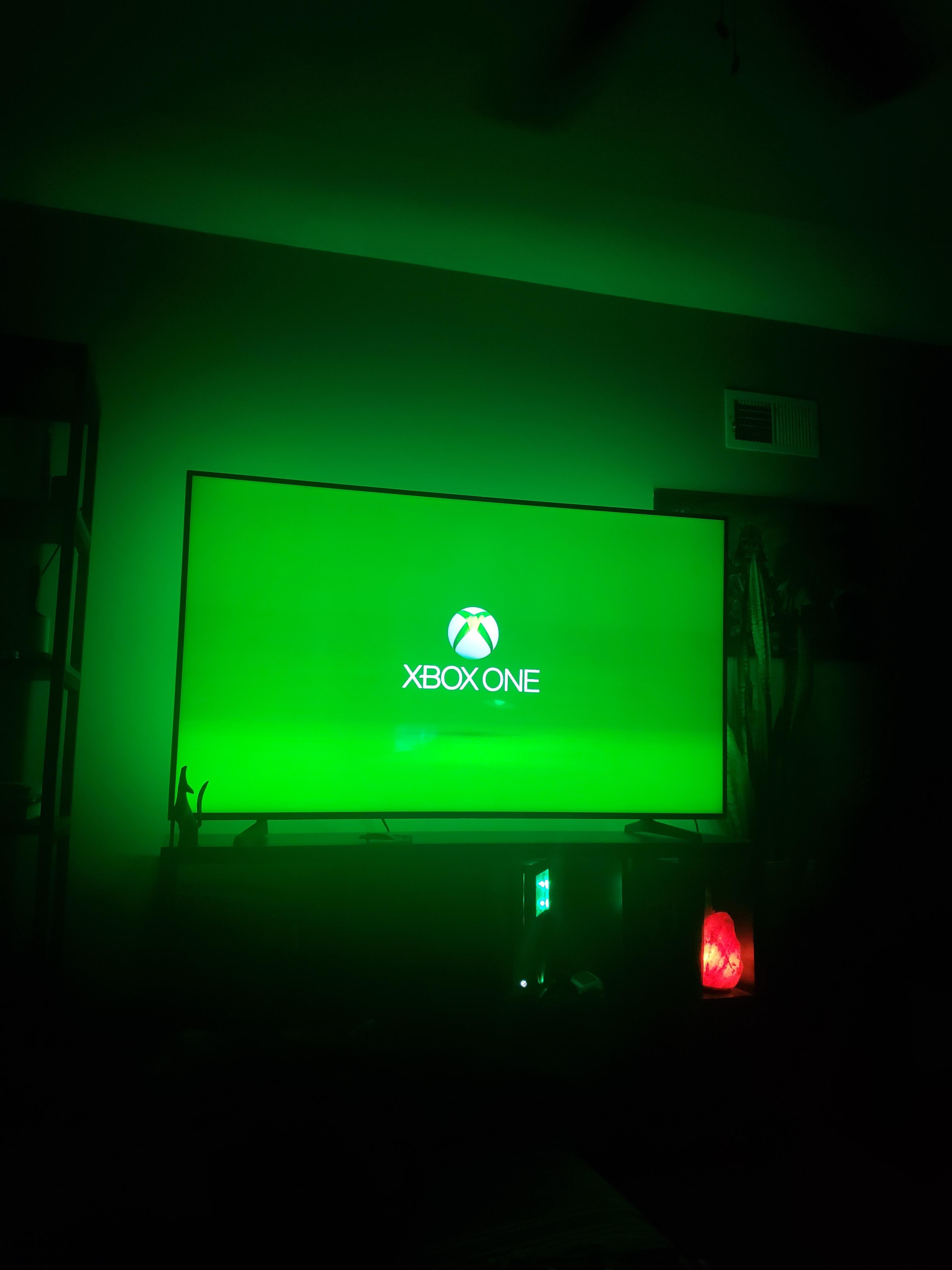 Installed some LED lights behind my tv.. There is nothing like the XBOX green! r/xboxone