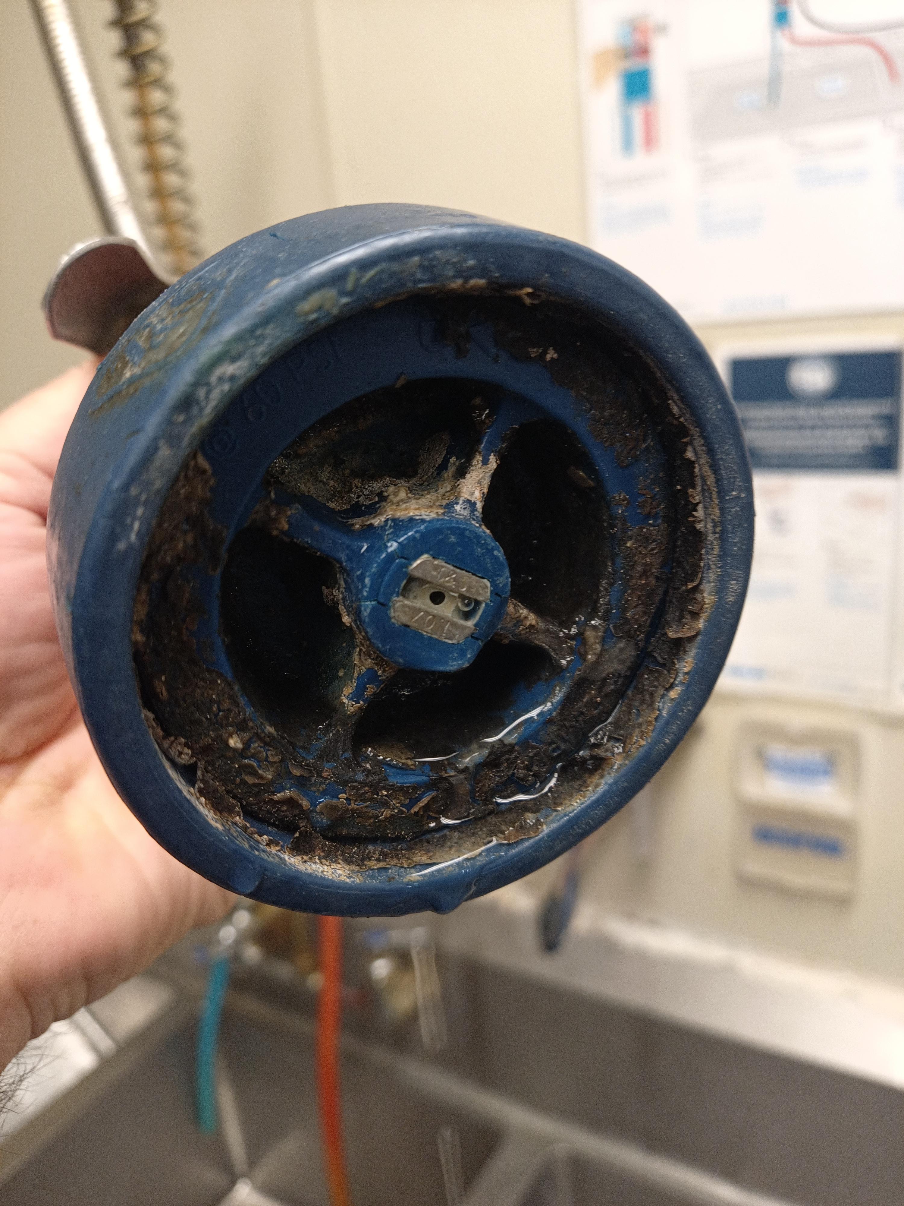 The handle was greasy so I turned over the spray faucet nozzle. r