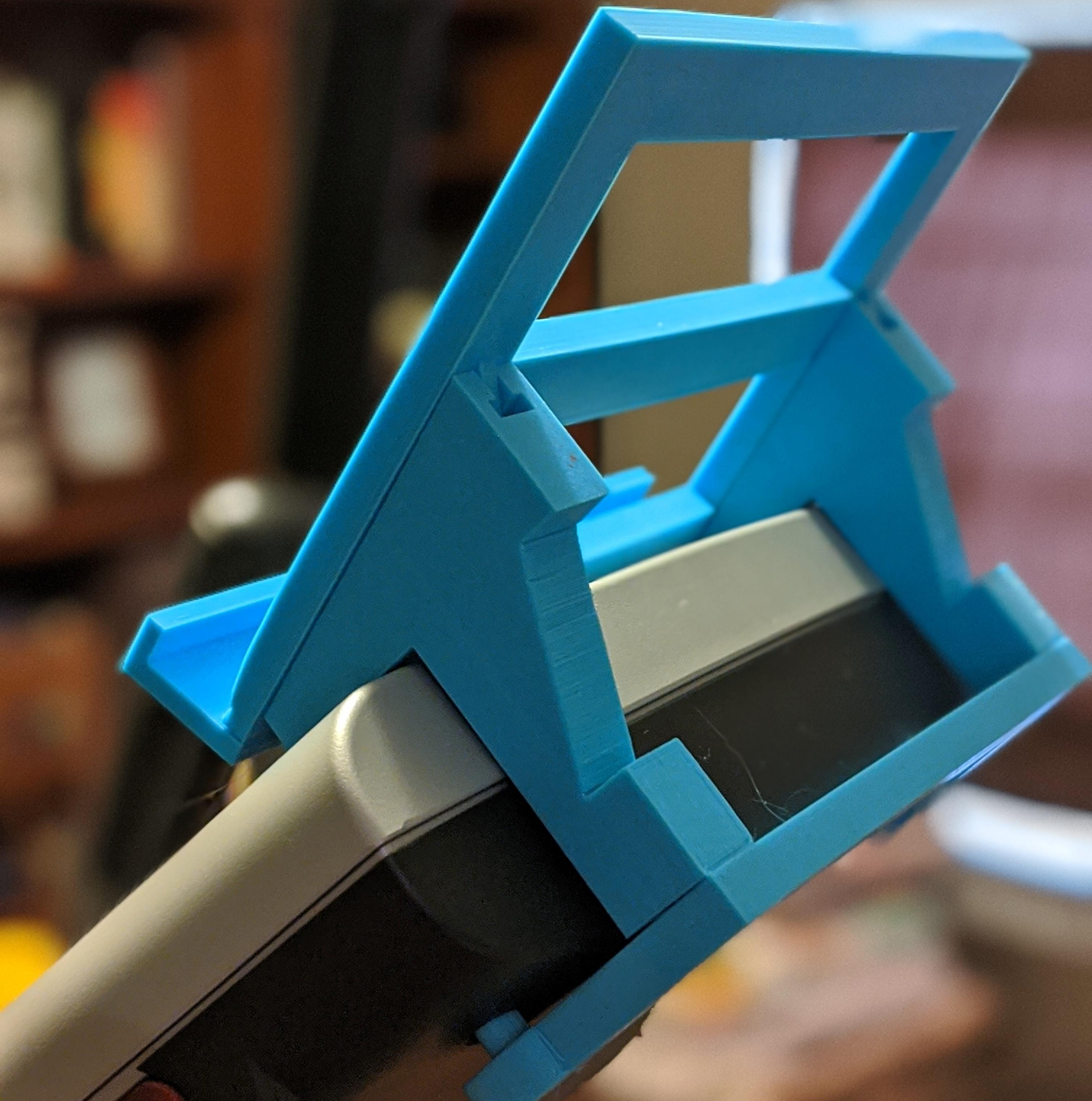 Tablet holder for elliptical machine. Designed in Tinkercad. r