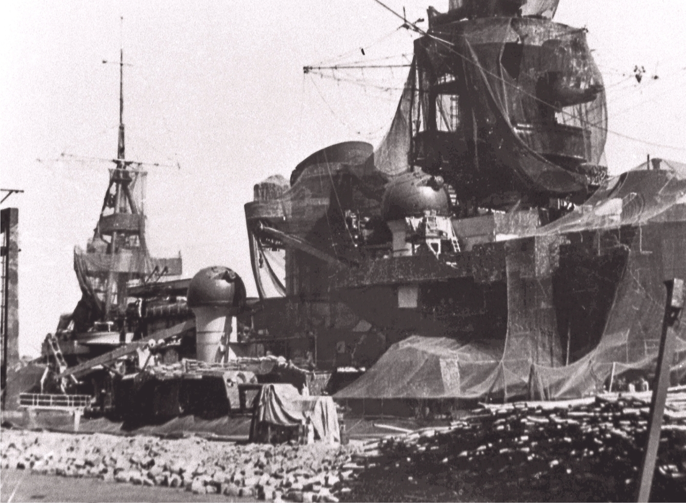 (1406 x 130) German battleship Scharnhorst is covered with the
