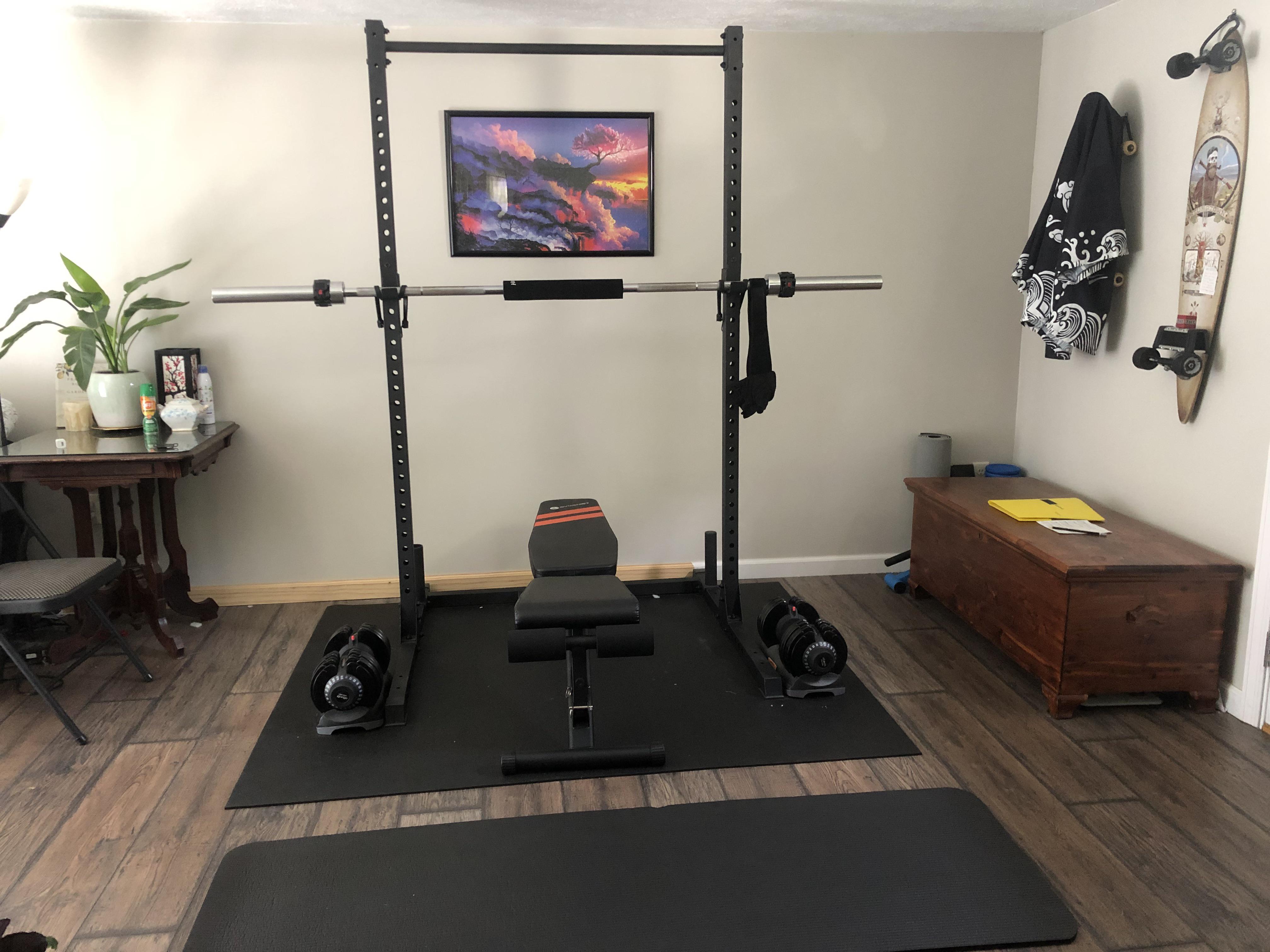 our tiny home gym set up is part of the living room but we store our