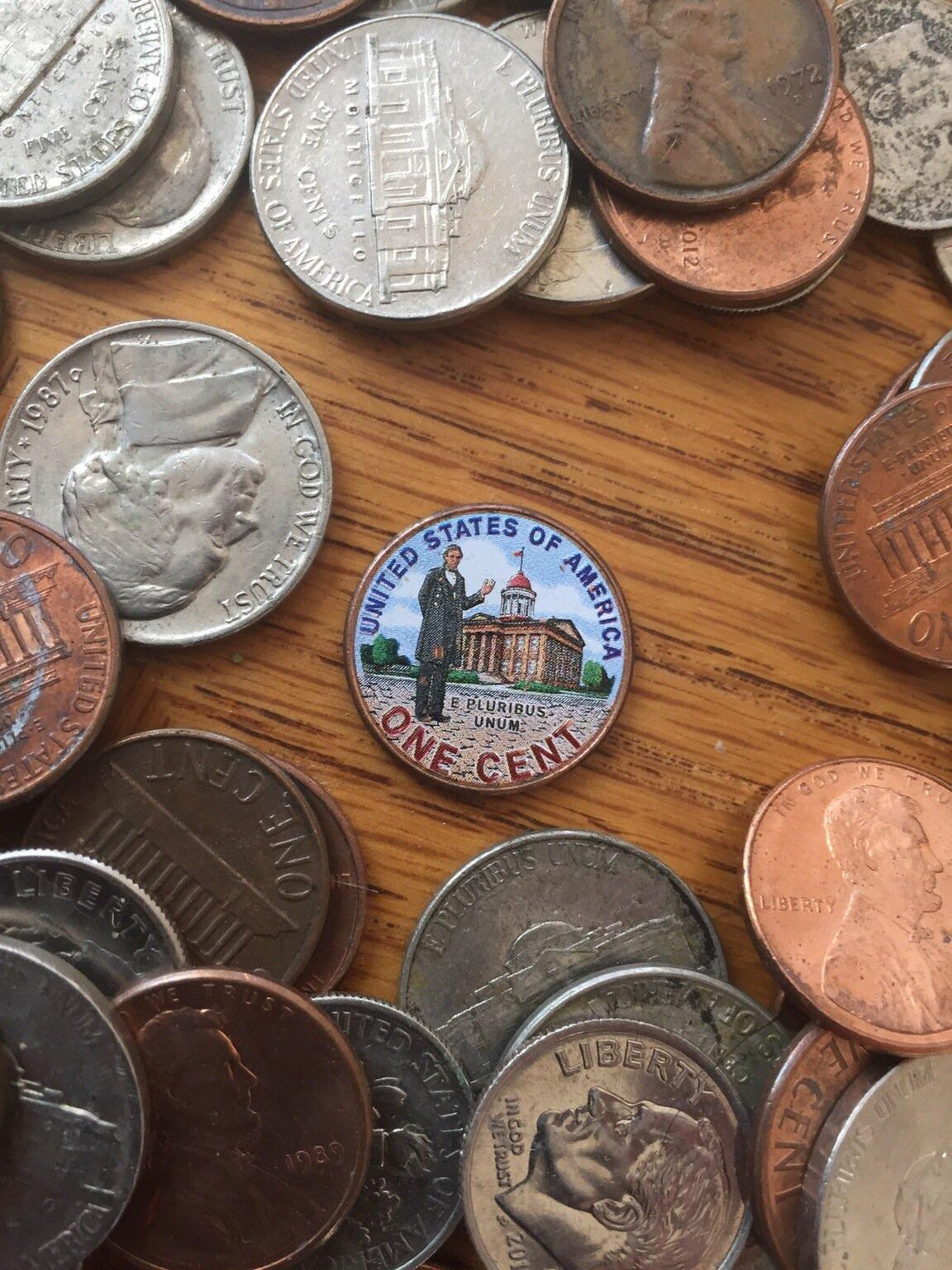 This painted penny in my coin jar. r/mildlyinteresting