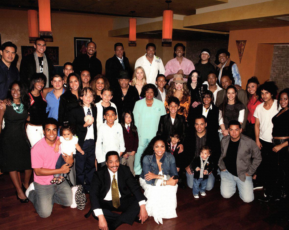 A photo of Michael with his friends & family at Hayvenhurst in 2009 r
