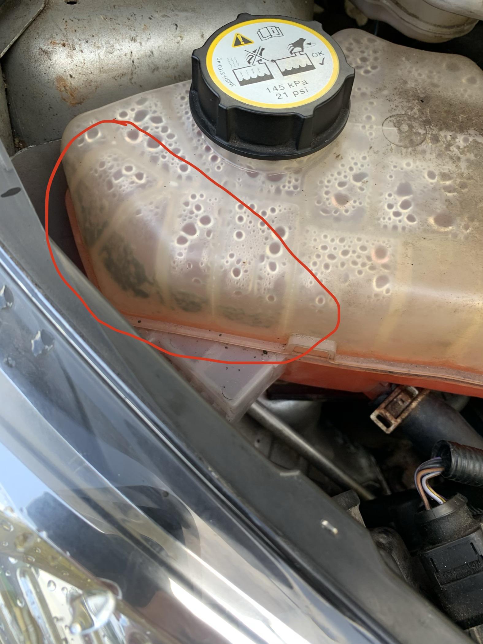 What’s this build up in my coolant expansion tank? r/mechanics