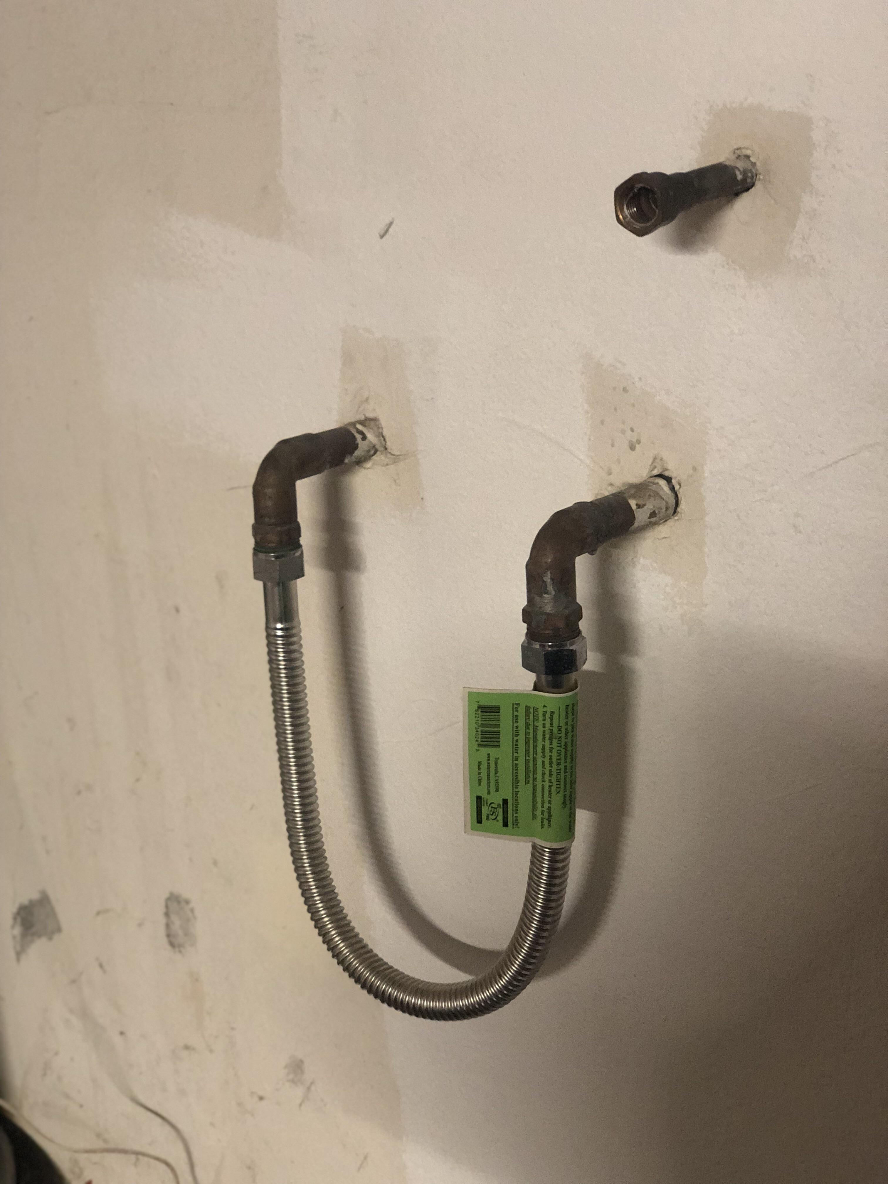 Installing a water softener and right above the inlet and outlet of the house water, there’s