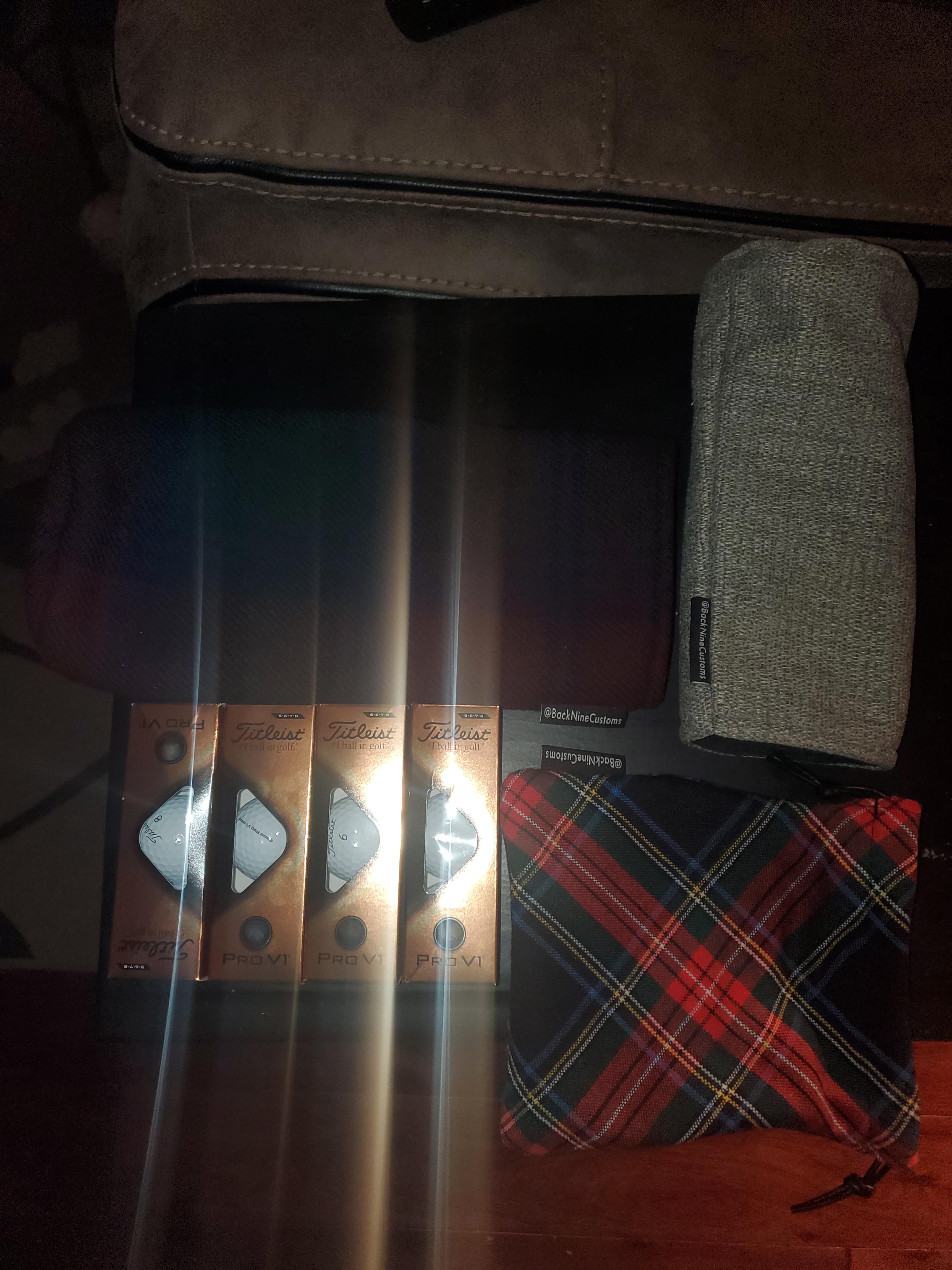 Secret santa haul! Thanks u/MaryLightlyIII SUPER AWESOME GIFTS! r/golf