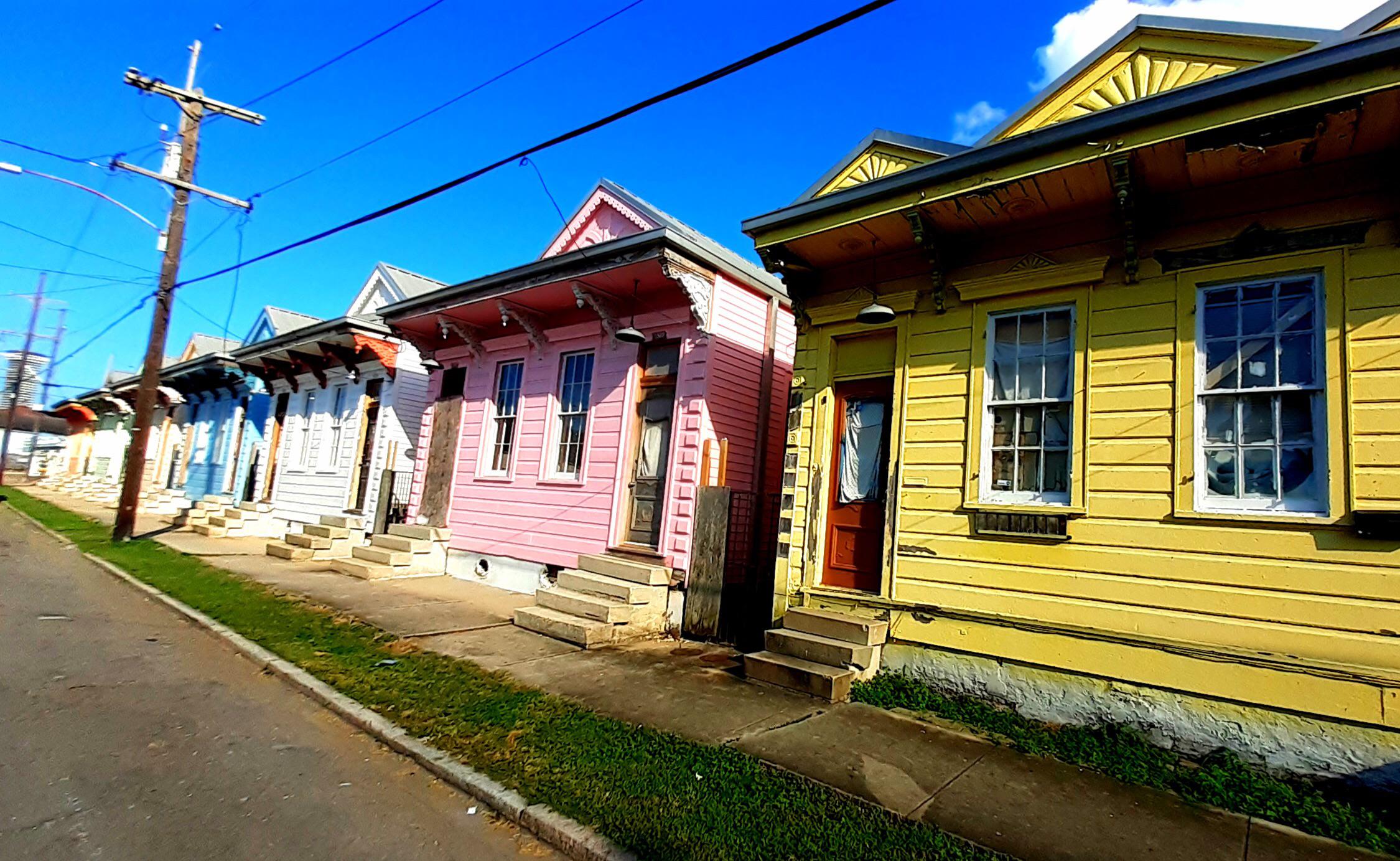 Old homes finally lovingly restored in bright colors. Freret Street