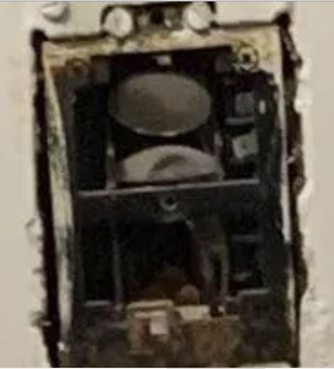 Electricians What is this round mirror thing inside of this outlet