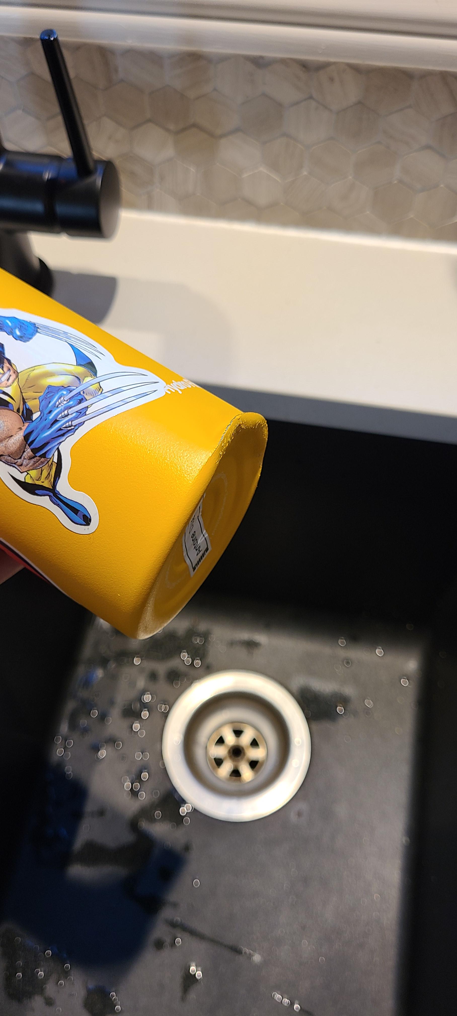 son dented a double layer water bottle. i can't push from inside due to