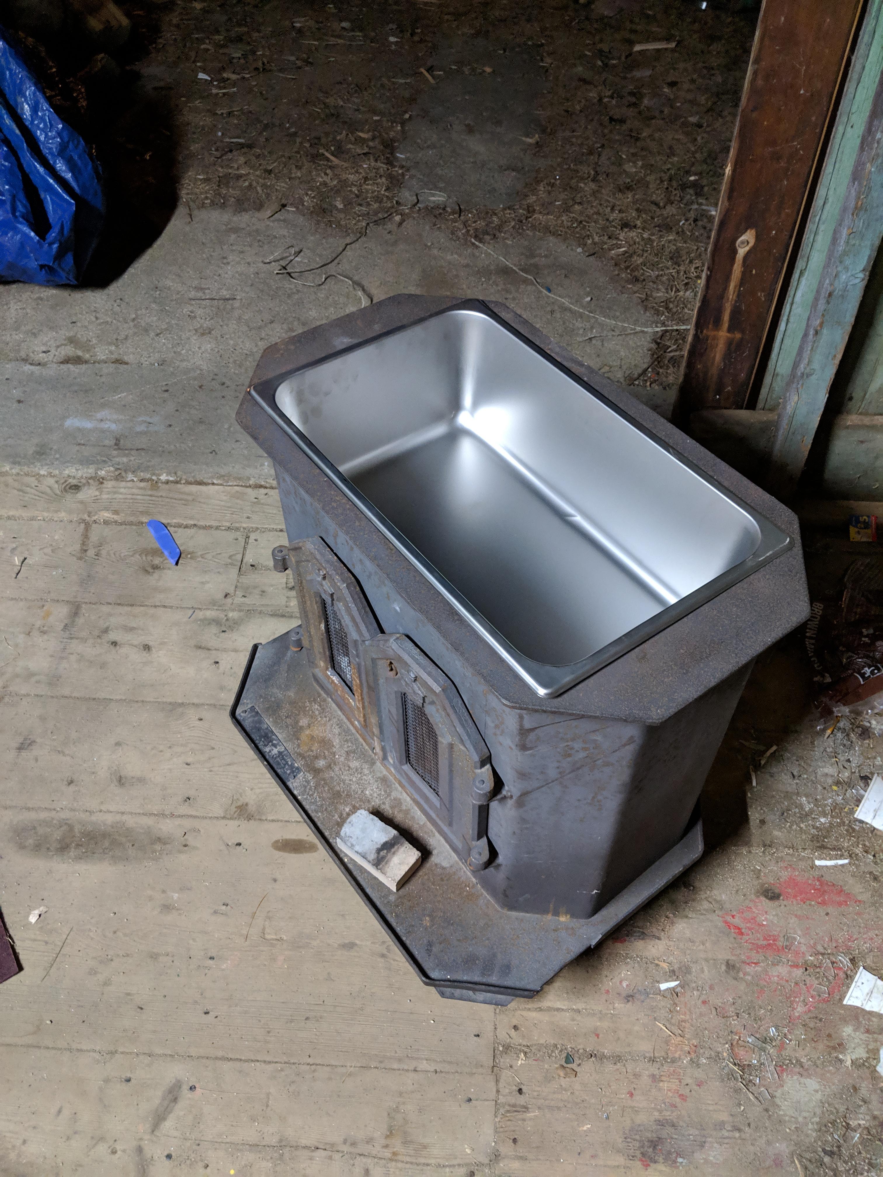 Turned an old wood stove into an evaporator. r/maplesyrup