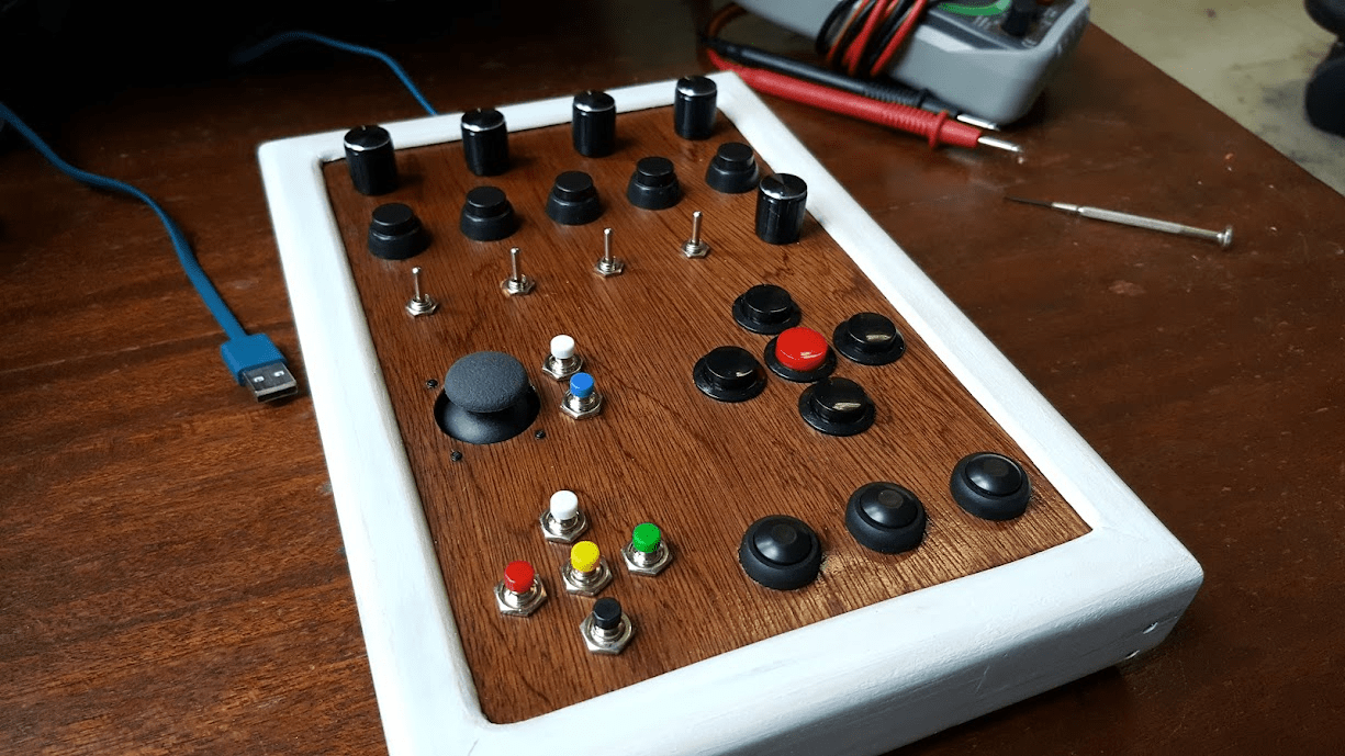 My first button box. Arduino Pro Micro, 32 joystick buttons, 4 rotary
