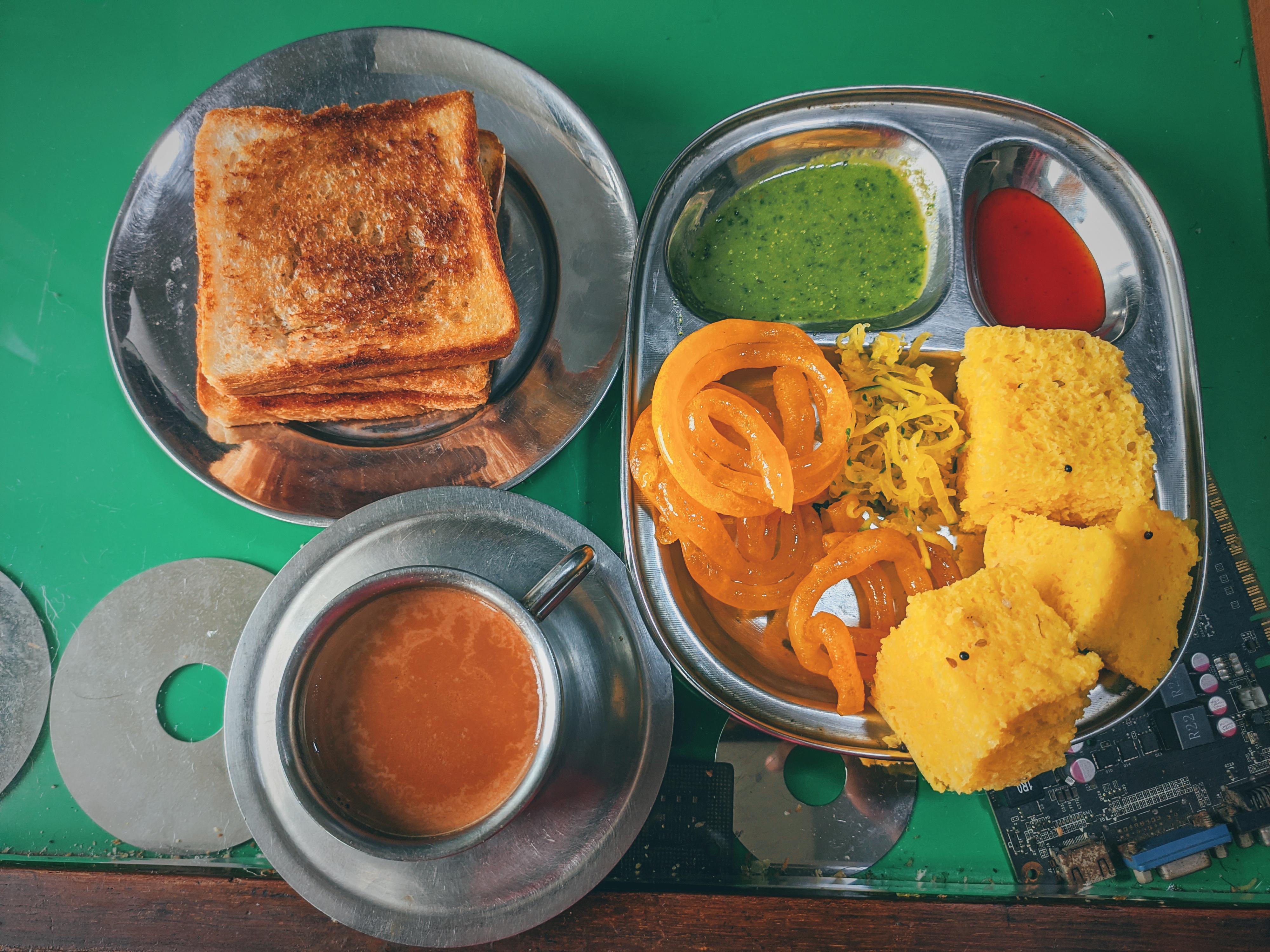 [I ATE] Gujarati breakfast (jalebi ,khamand) bread toast and tea r/food