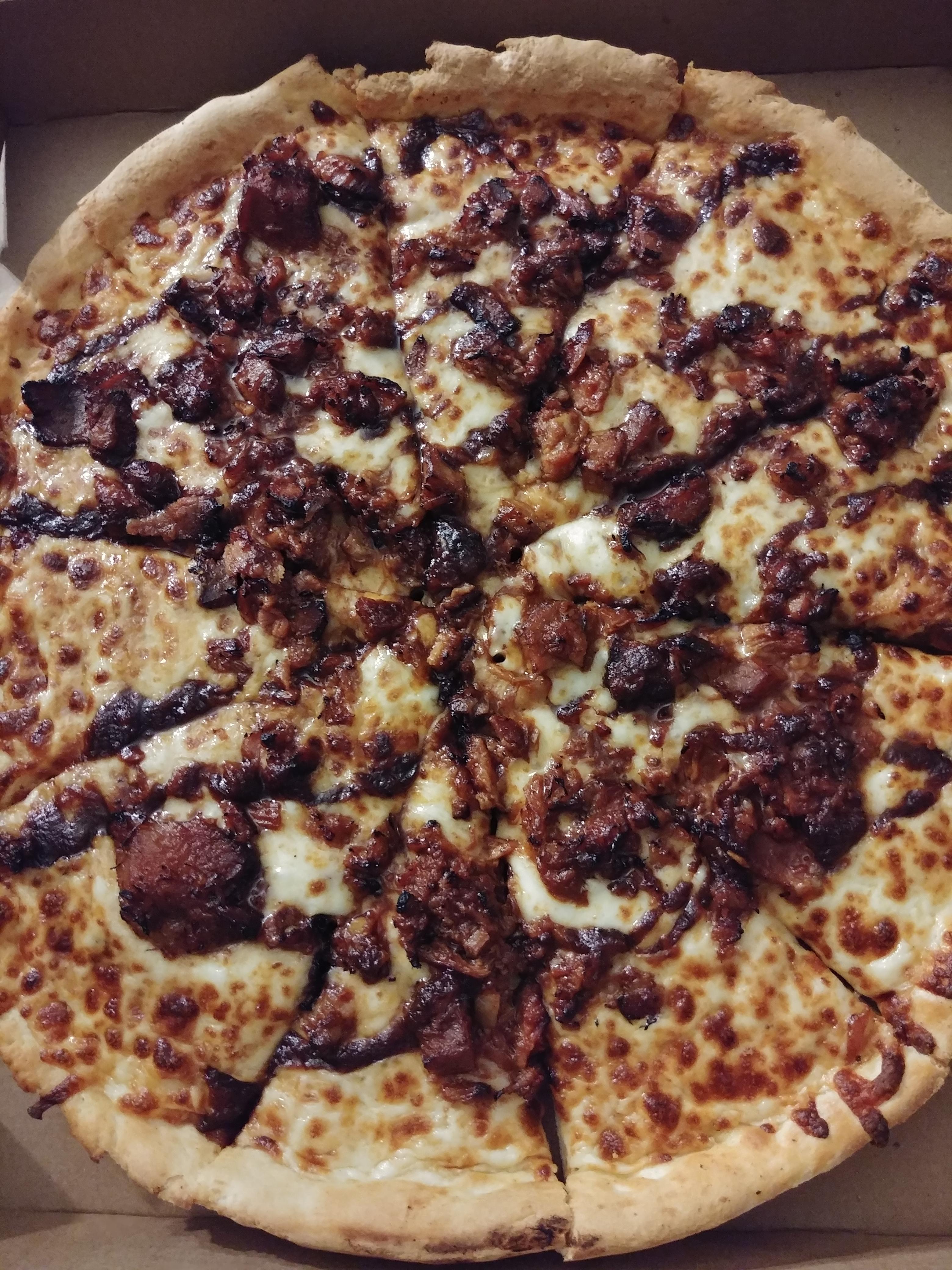 Very well known BBQ joint Joe's Kansas City teamed with local pizza