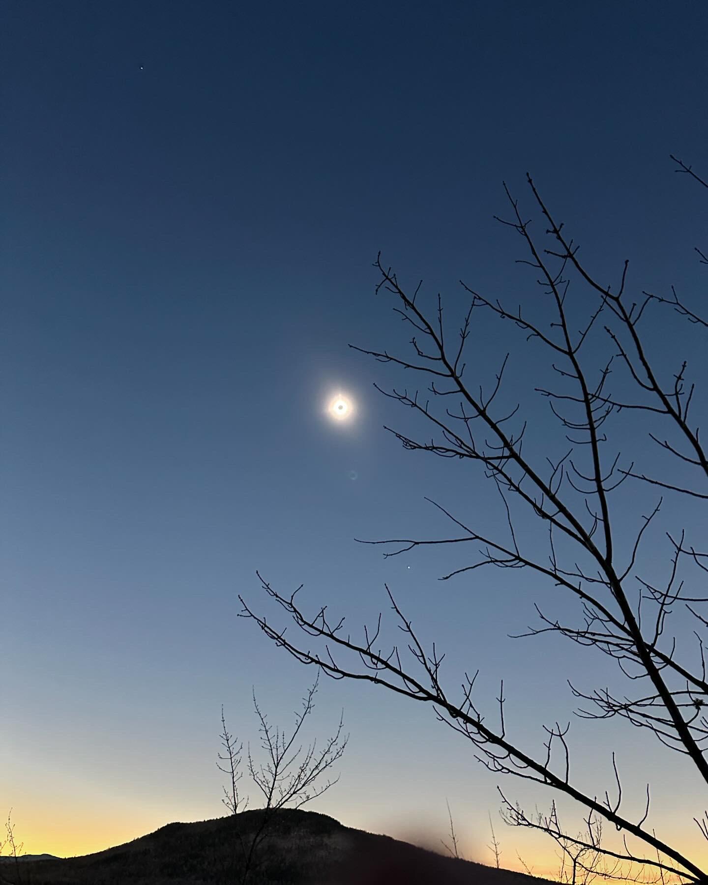 Eclipse on Wood Pond in Jackman, Maine. r/solareclipse