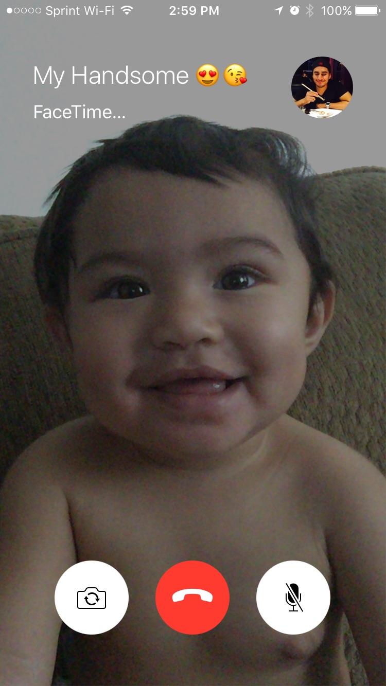 Our 9 month old daughter waiting for daddy to answer her FaceTime call