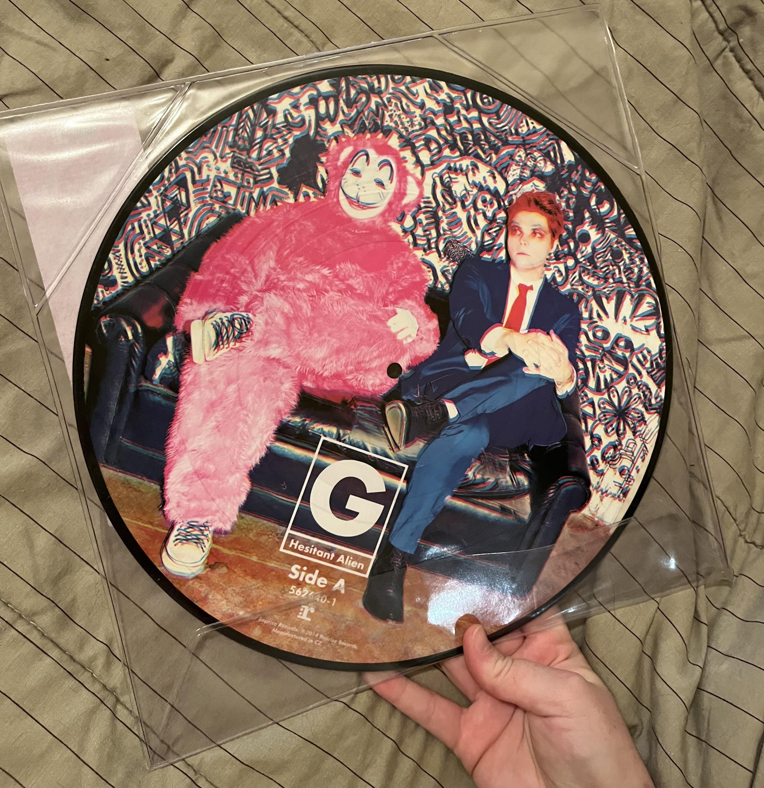 How much do the image press Hesitant Alien vinyls resell for? I opened