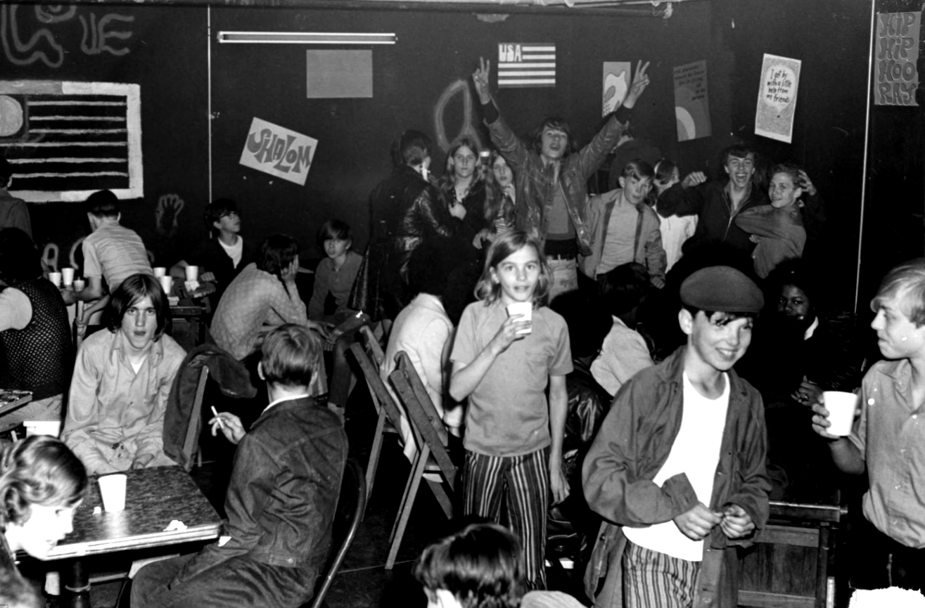 Children and young adults attend a coffeehouse in the Kensington YWCA