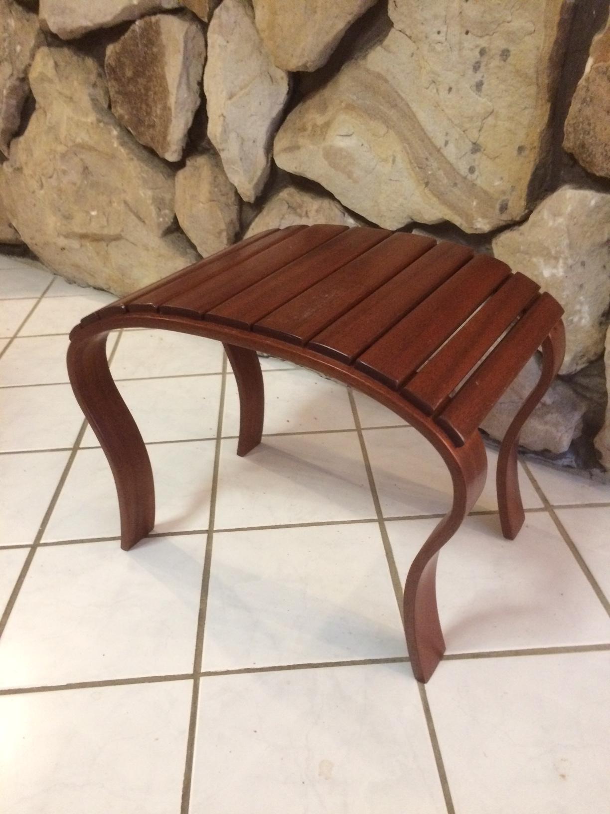I wanted a shower stool that would drain. This is made of mohogany solids and table saw made