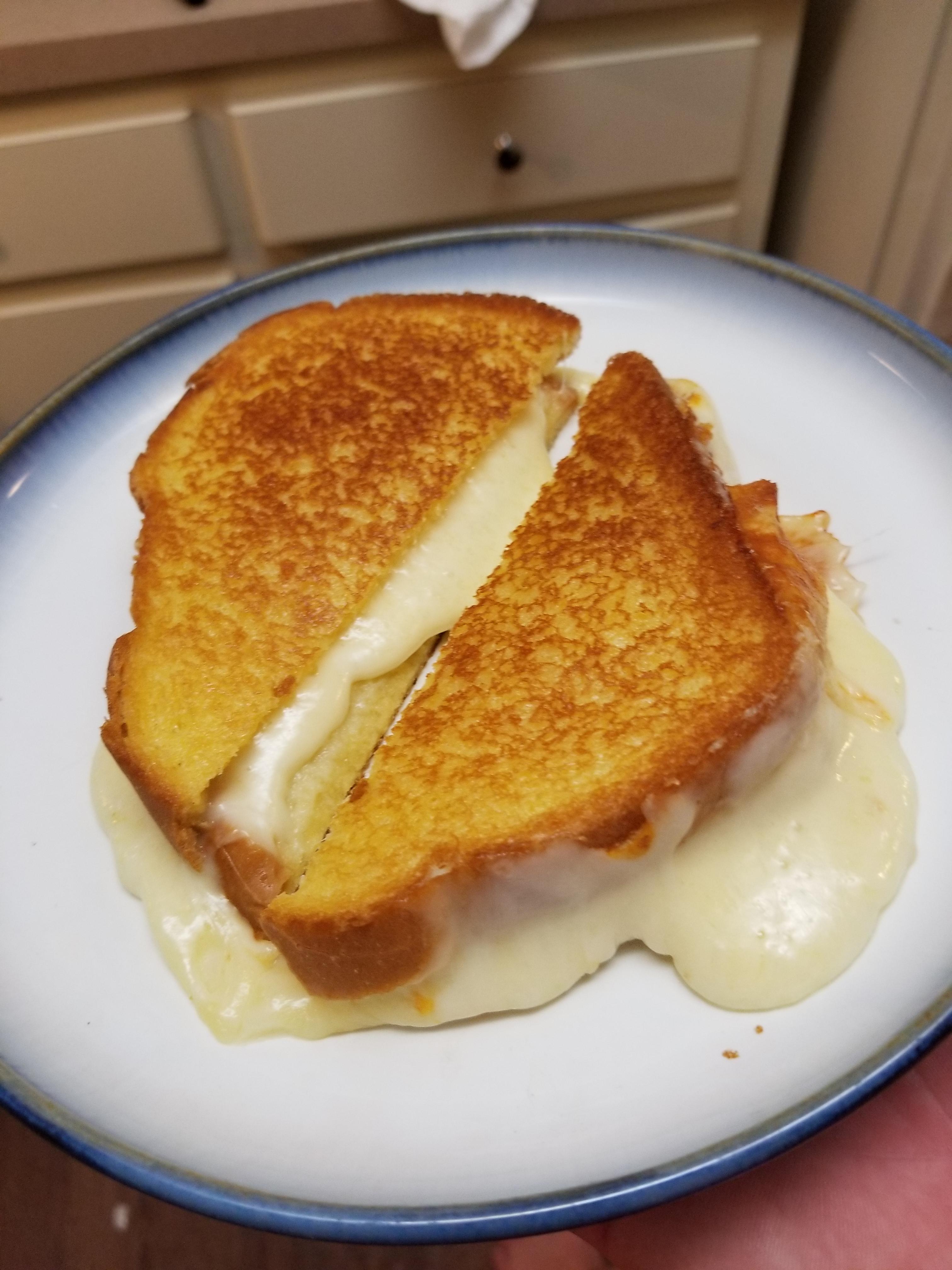 Muenster/gouda on potato roll r/grilledcheese