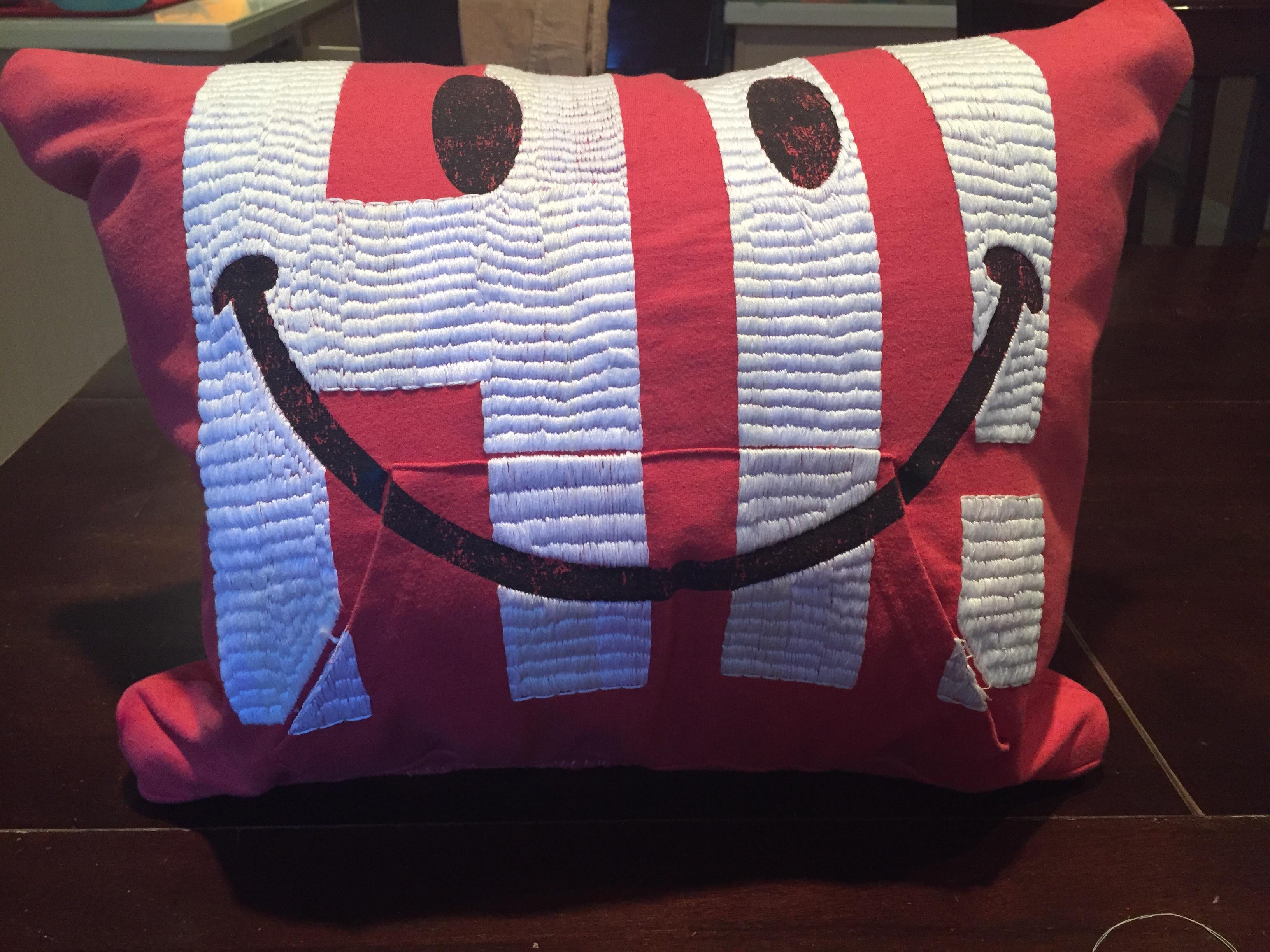 Turned my favorite hoodie from high school into a decor pillow for my