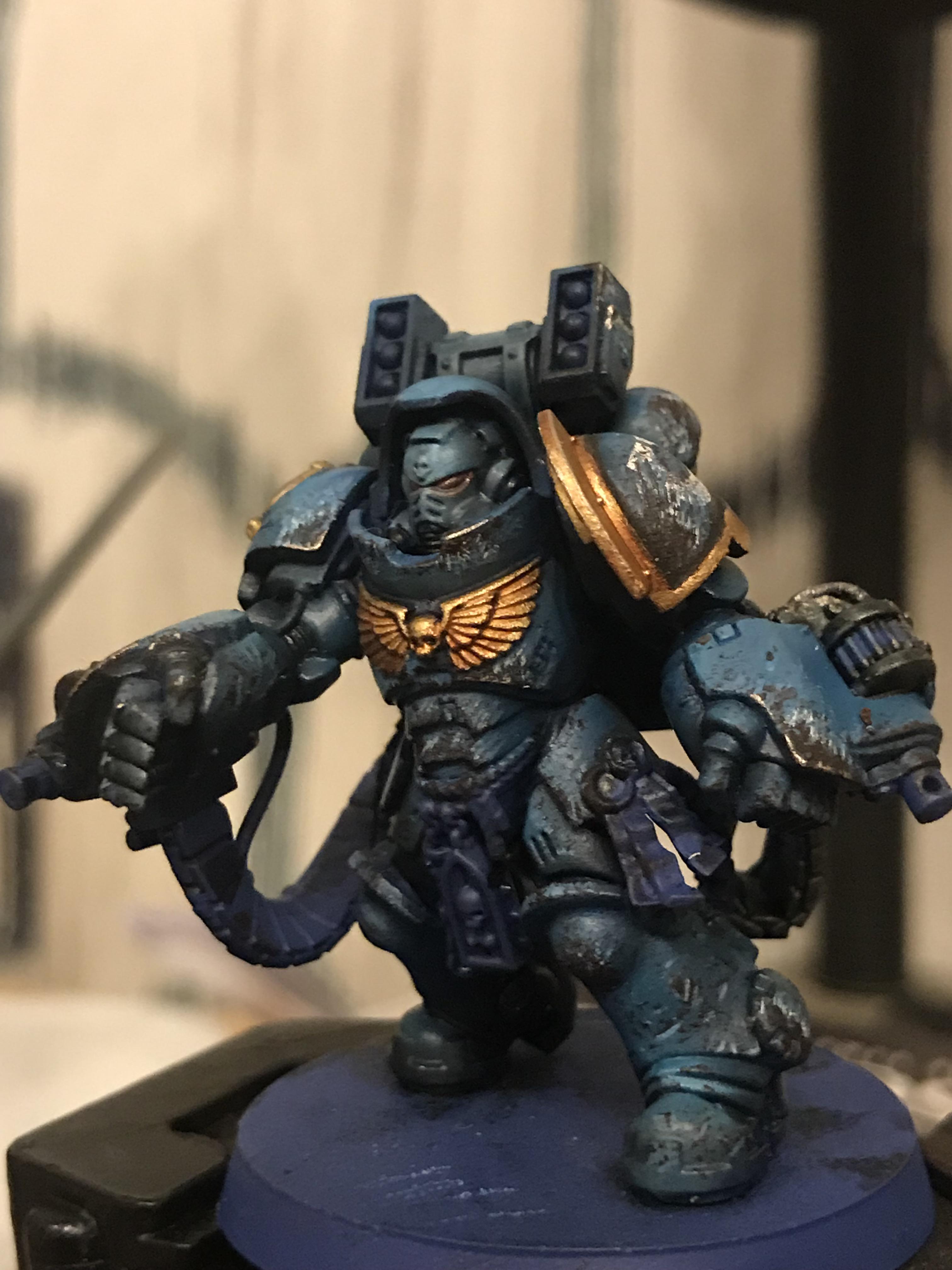 WIP on grimdark smurf. First time using oils and painting chipping