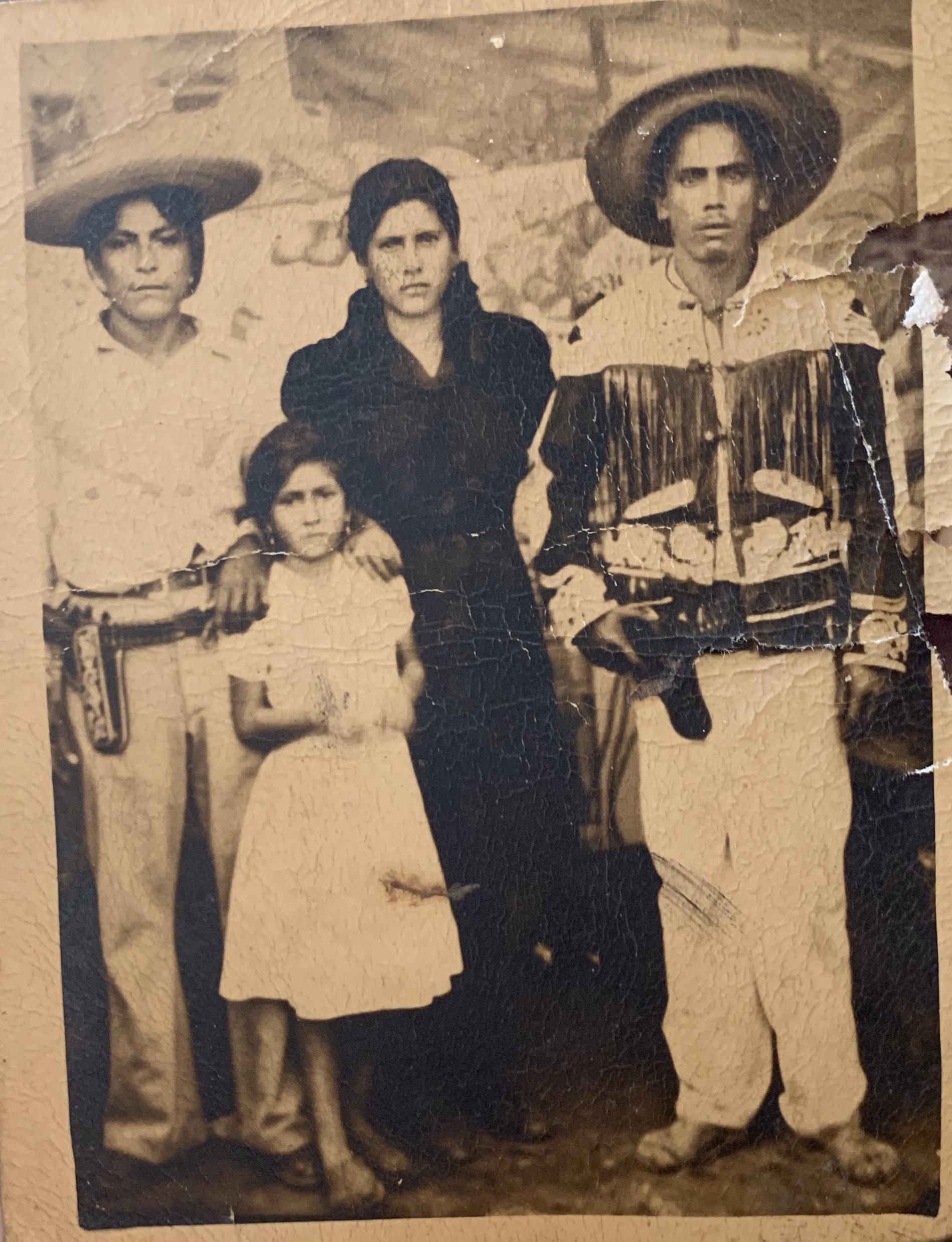 My great grandfather on the right alongside other family members I have