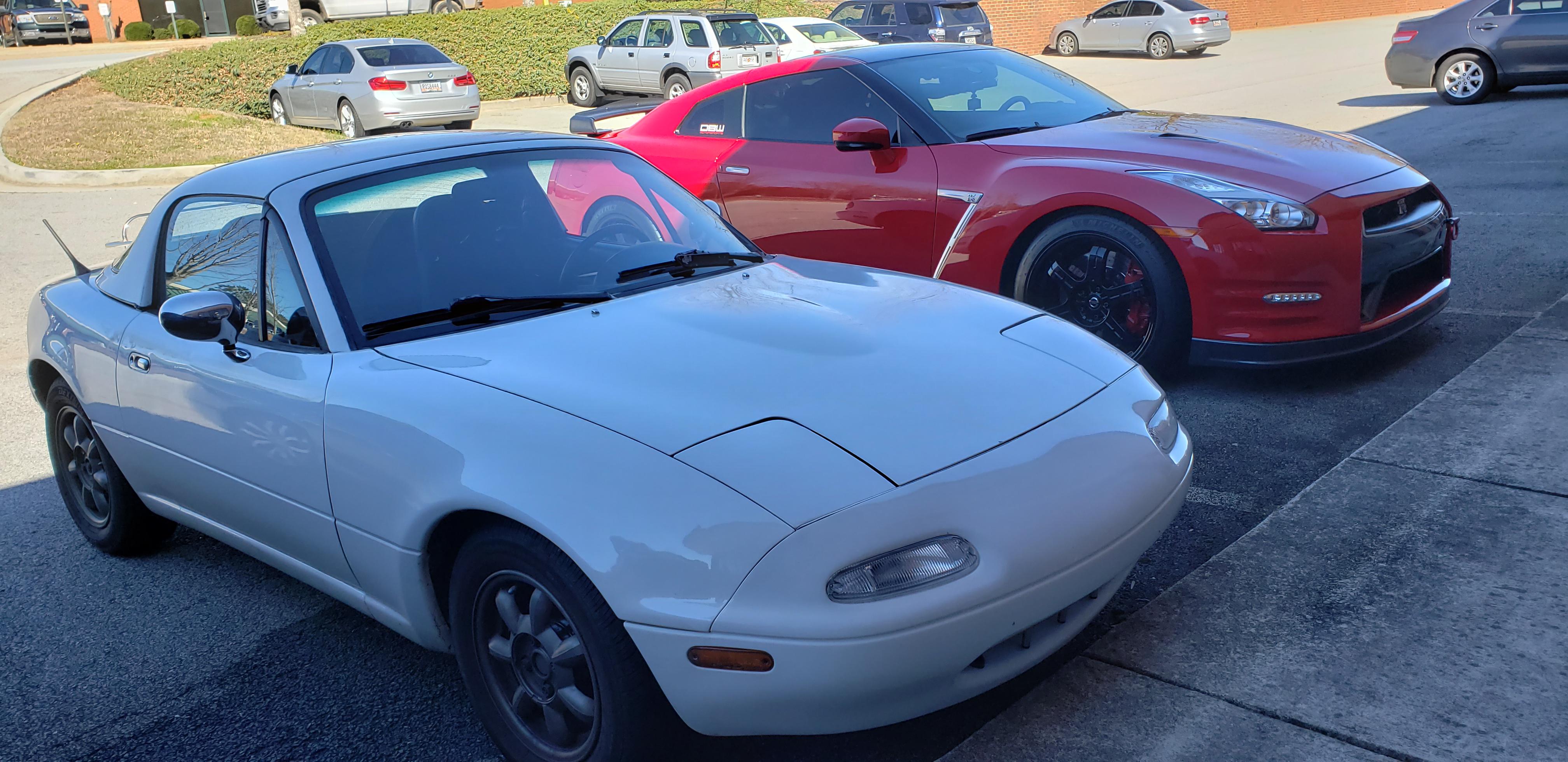 One of these is an iconic Japanese sports car, the other is a GTR. r