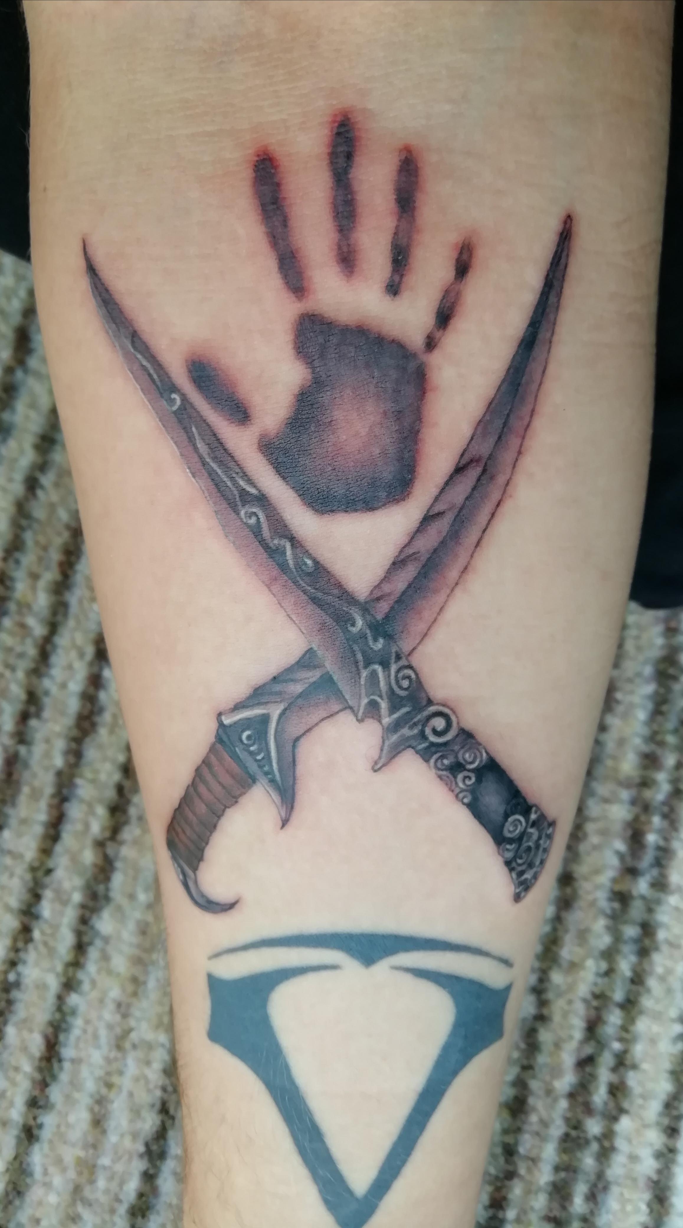 My Dark Brotherhood tattoo done by Sarah at Victory Doll