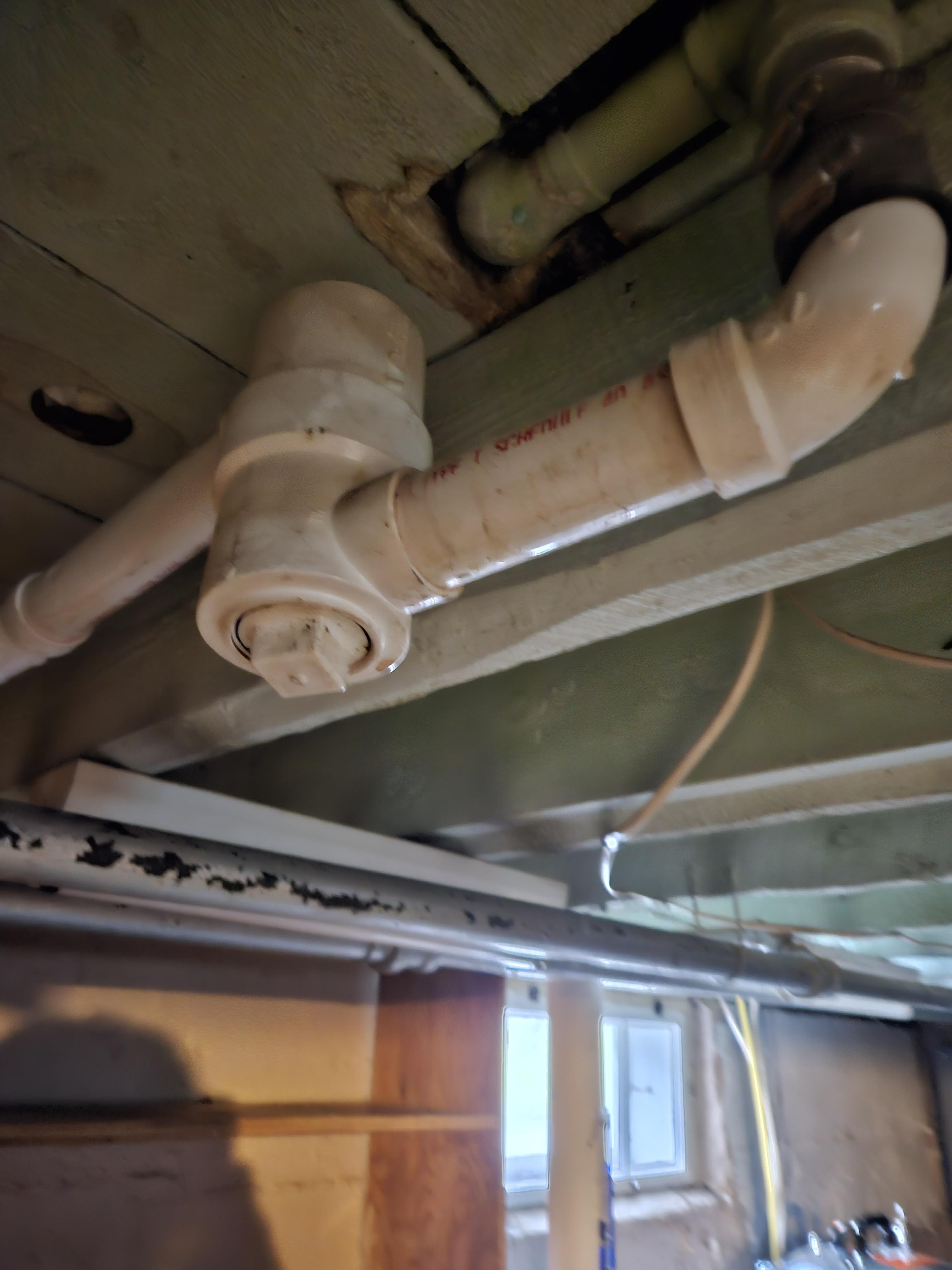 My bathtub is draining slowly and I see where it is plumbed in the