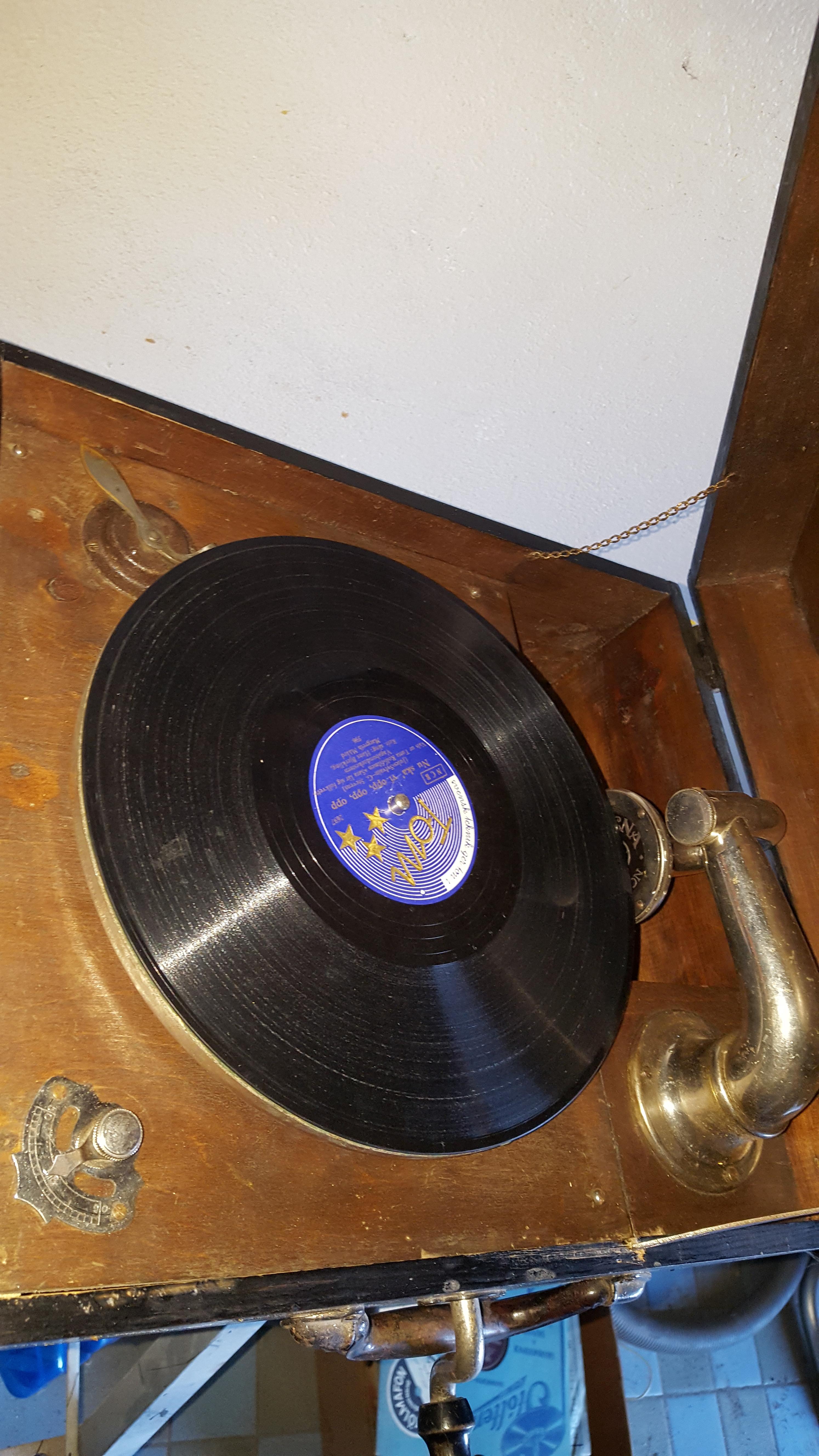 Gramophone. I don't know how old it is (maybe 1930s) and how much it