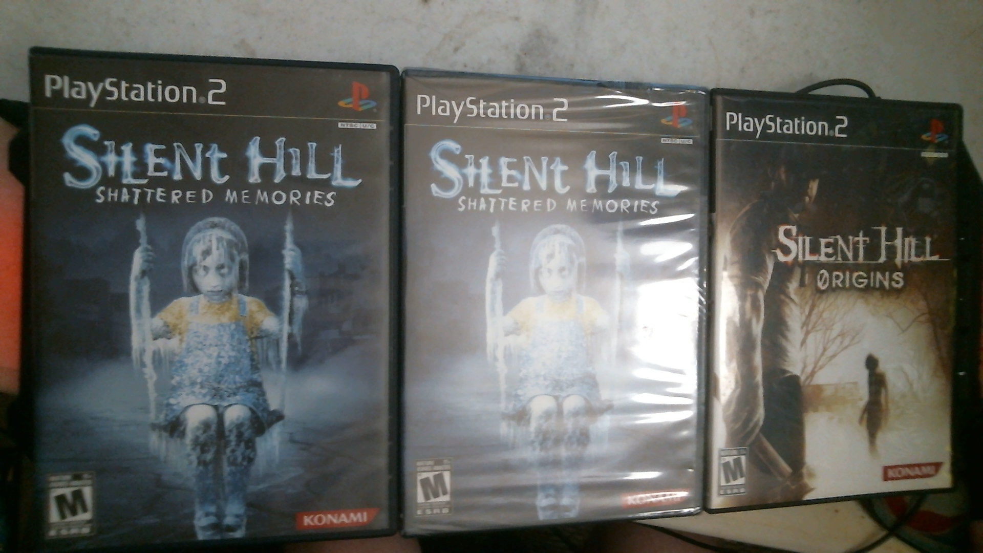 2 copies of silent hill shattered memories ps2, one is sealed, i bought