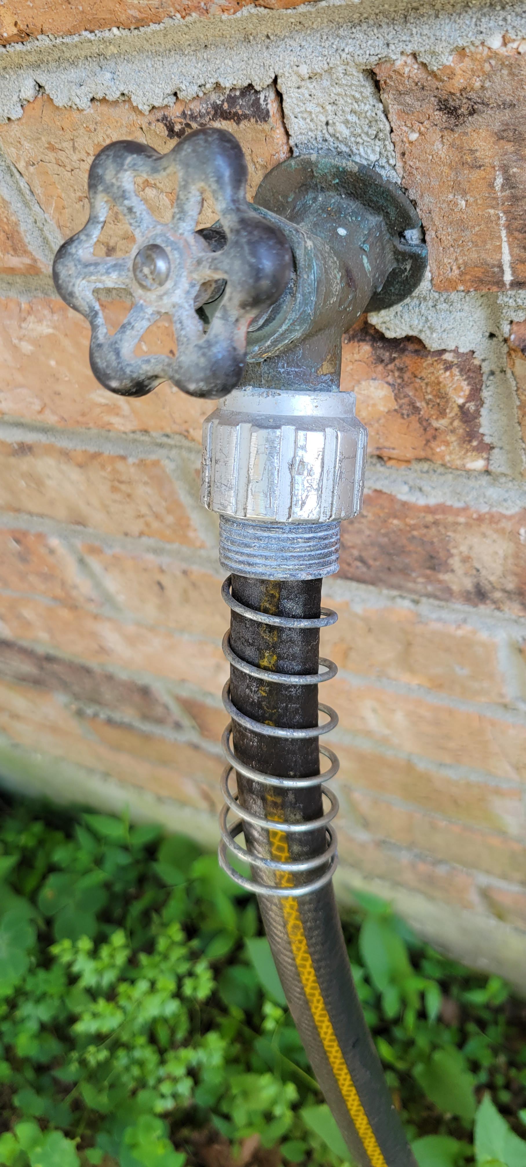 Water Hose Stuck. I've tried channel locks, heating it, to no avail