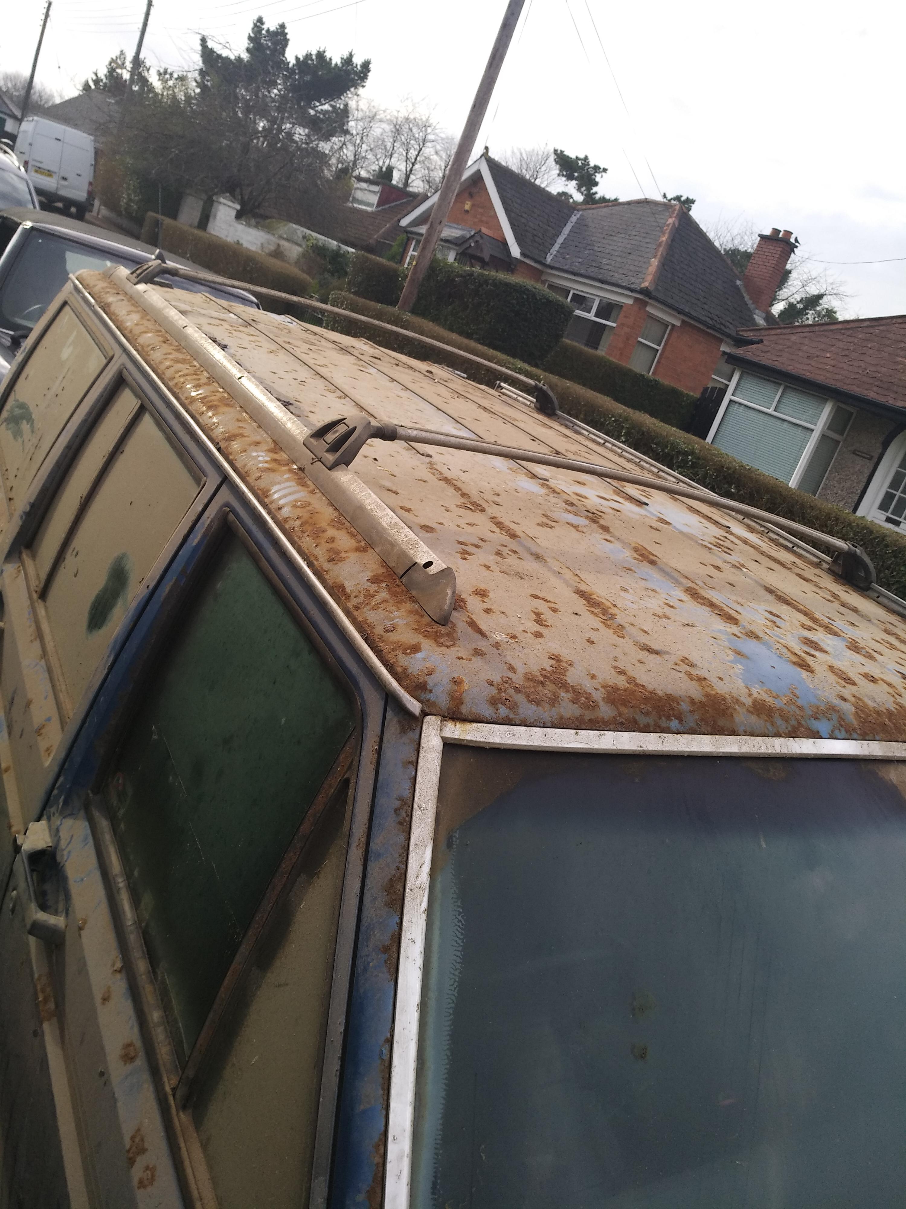Can I fibreglass over a (previously rusty) now bare metal roof or