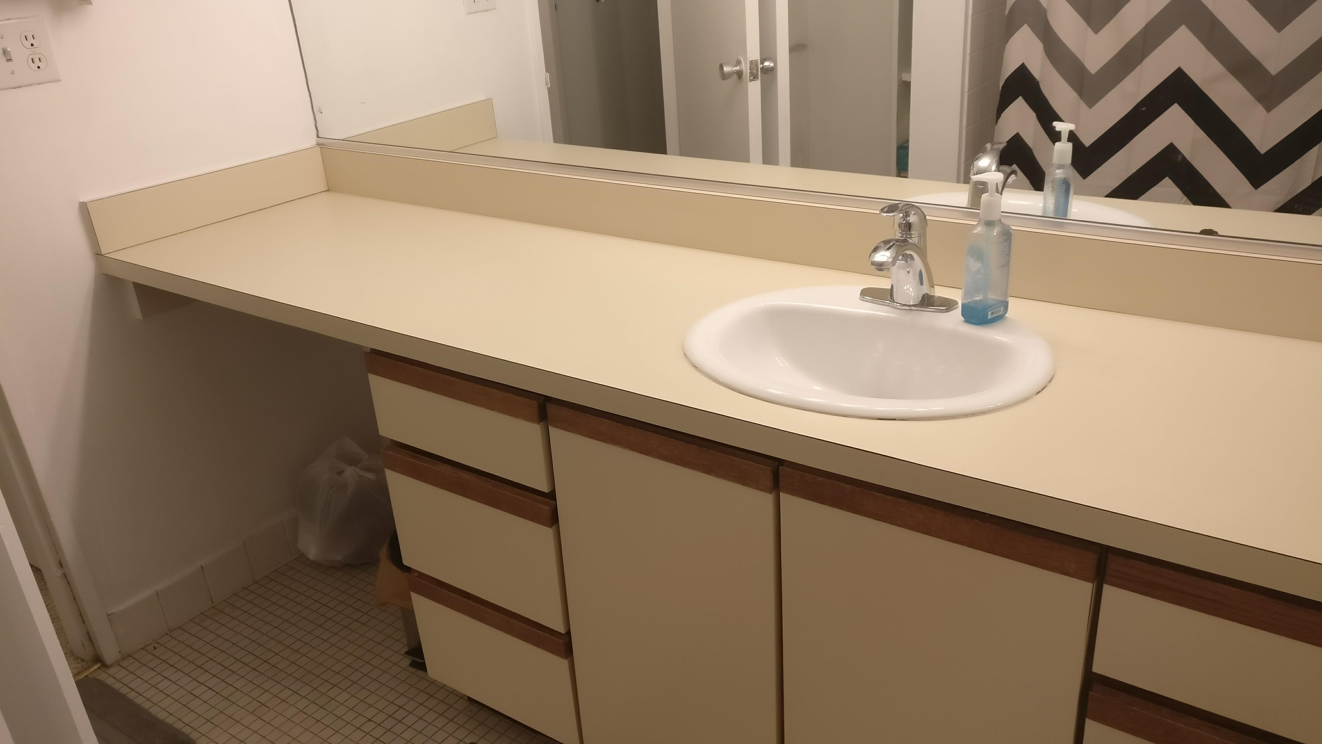 Advice what can i put in my long bathroom counter to make it look