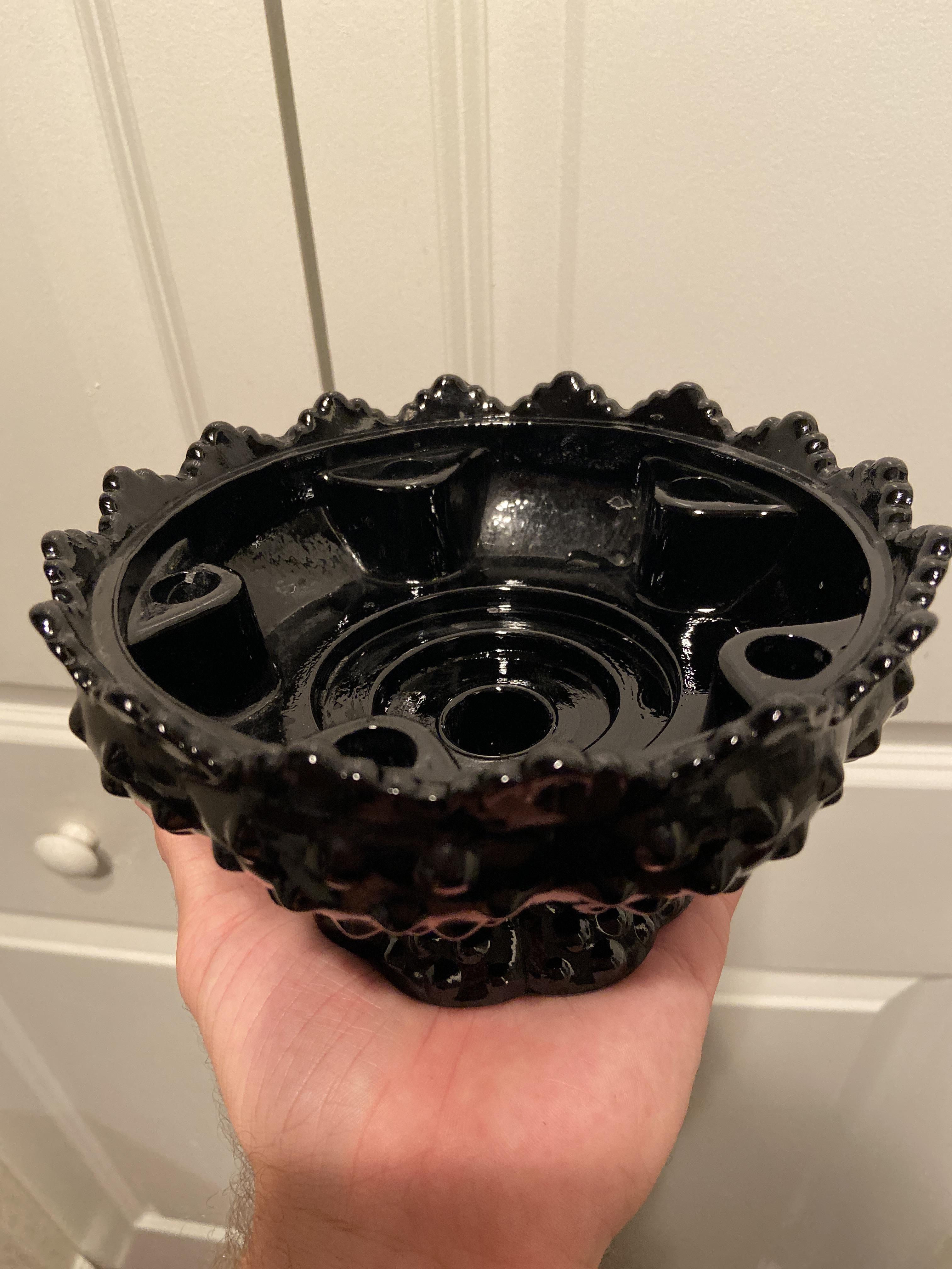 Black milk glass? I think it’s a candlestick holder or something? r