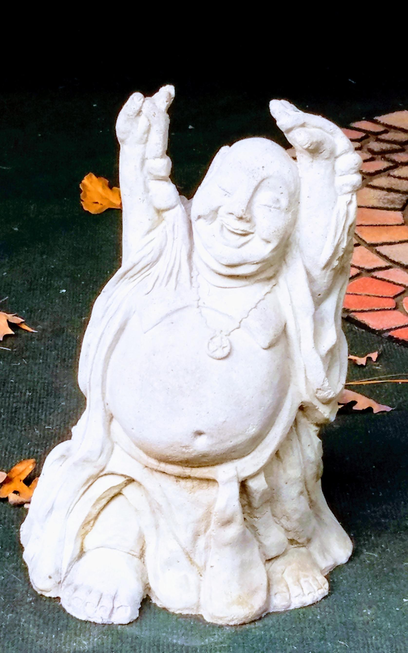 This Buddha statue on my grandmother's front porch was not wearing a