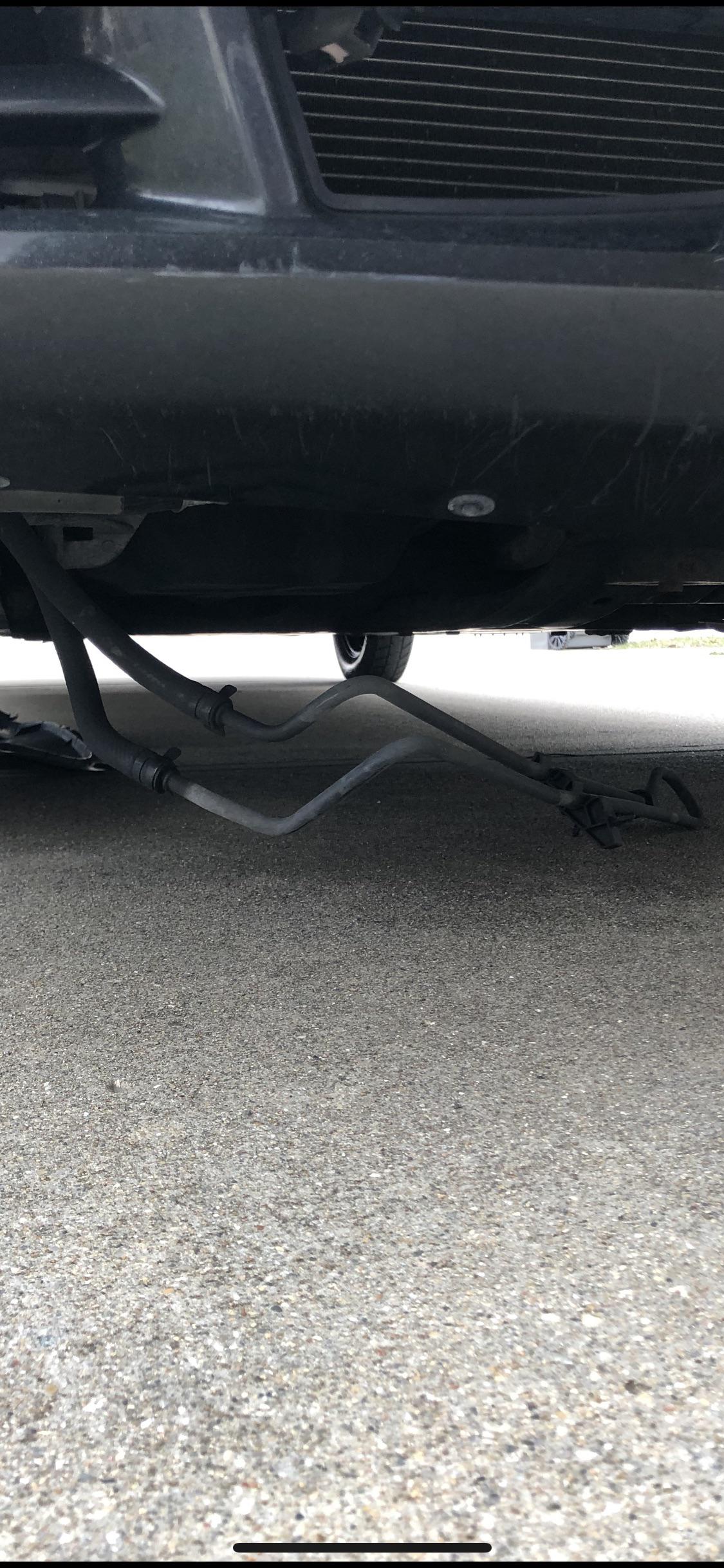 What is this part dragging under my car? (More in comments) : r